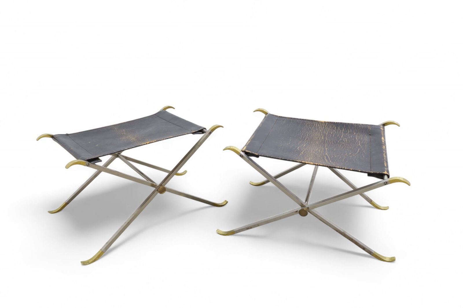 Maison Charles Leather Folding Benches - Pair: A pair of Maison Charles steel, brass and leather folding benches Dimensions:15.5x23x15