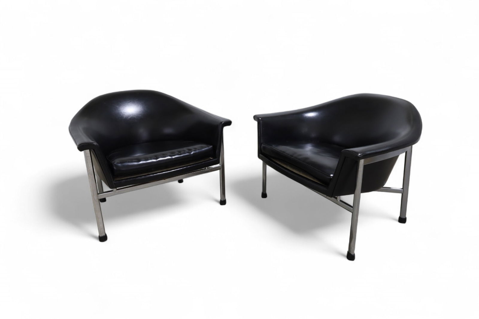 Dux Black Leather Lounge Chairs - Pair: A pair of mid century modern Dux black leather and chrome lounge chairs Dimensions: 26x31x28 Seat Height:16
