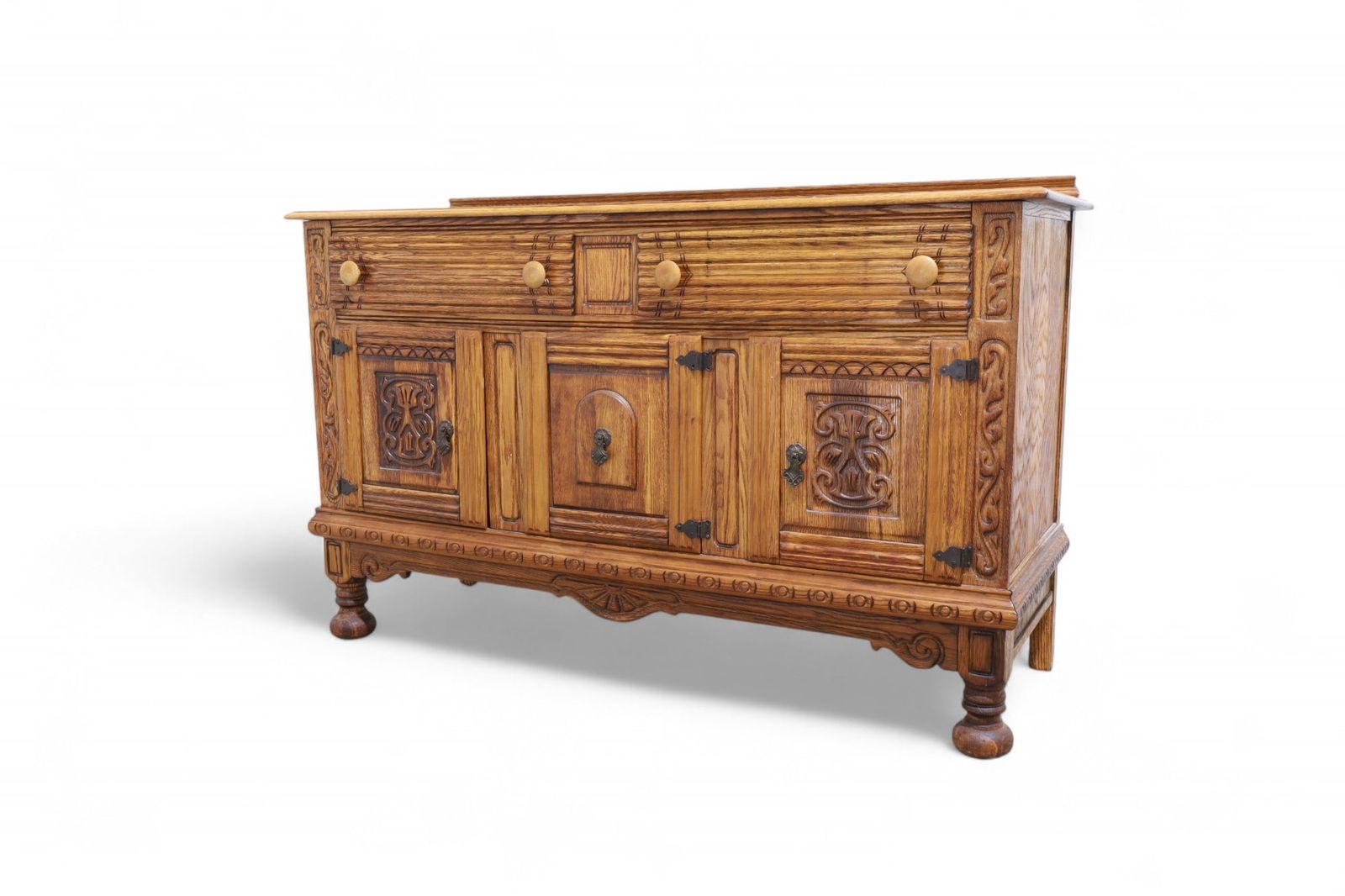 Virginia House Carved Oak Sideboard: A Virginia House carved oak sideboard Dimensions:38x60x21