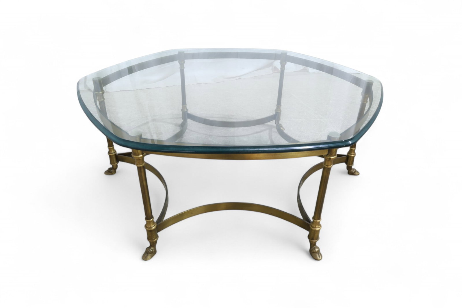 Brass Hoof Foot Coffee Table: A hoof foot glass top brass coffee table Dimensions:16x39