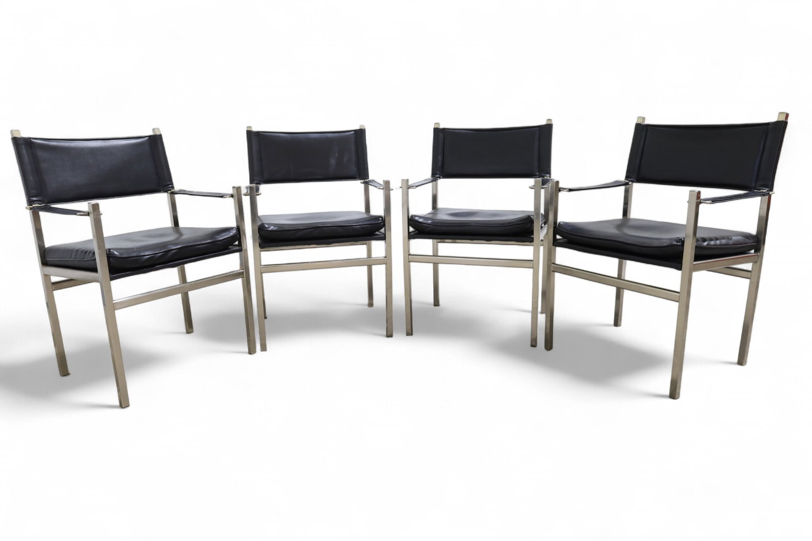 Allmark Chrome Arm Chairs - 4: A set of 4 Allmark chrome chairs with strap arms Dimensions:33.5x22x20 Seat Height:19