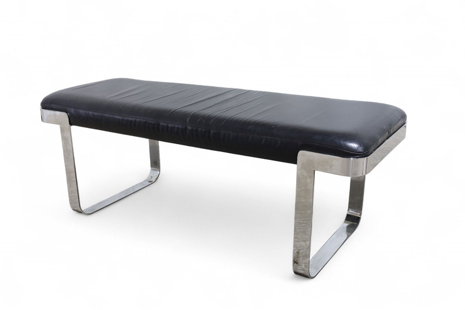 Milo Baughman Chrome Bench: A Milo Baughman chrome frame bench with vinyl upholstery Dimensions:17x48x19