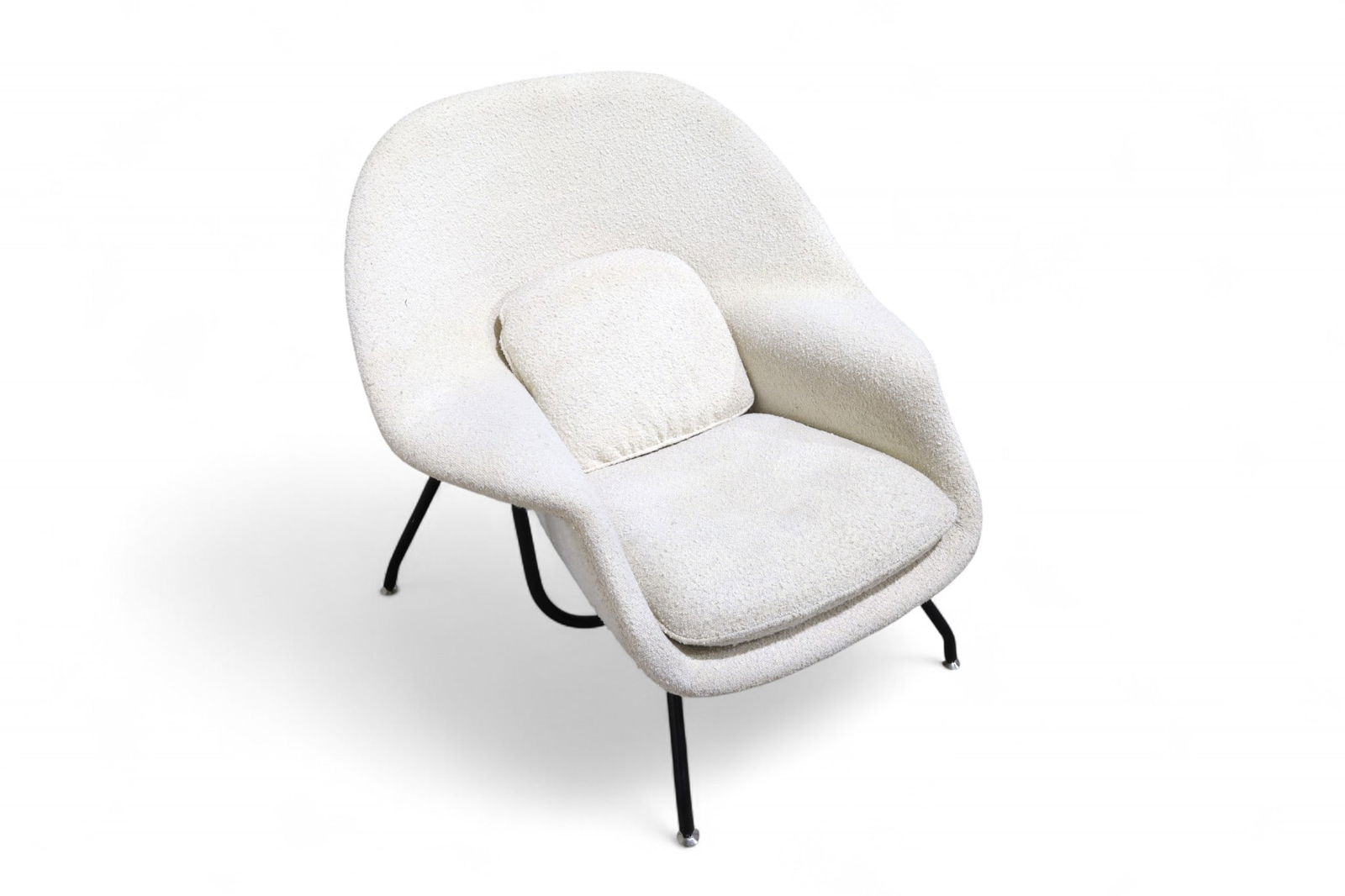 Knoll Style Womb Chair: A Knoll style womb chair, upholstered in Boucle fabric Dimensions:34x37x36 Seat Height:16