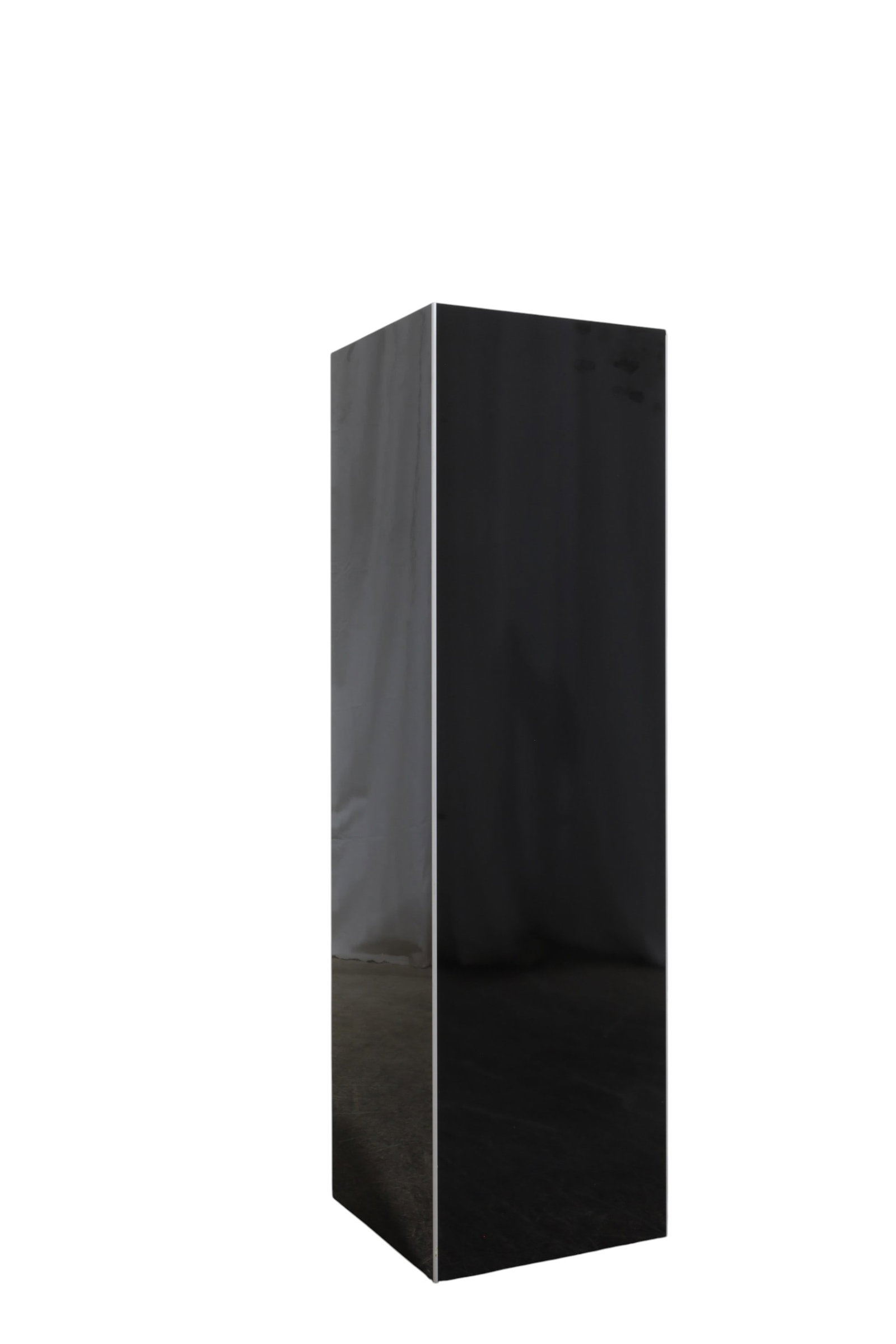 Lacquer & Aluminum Pedestal: A black lacquer pedestal with aluminum accents on corners