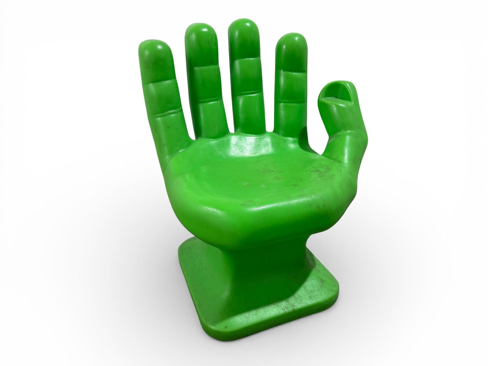 RMIC Molded Plastic Hand Chair: A RMIC green molded plastic hand chair Dimensions: H:"33.5 W:26" D:27" Seat Height:17"