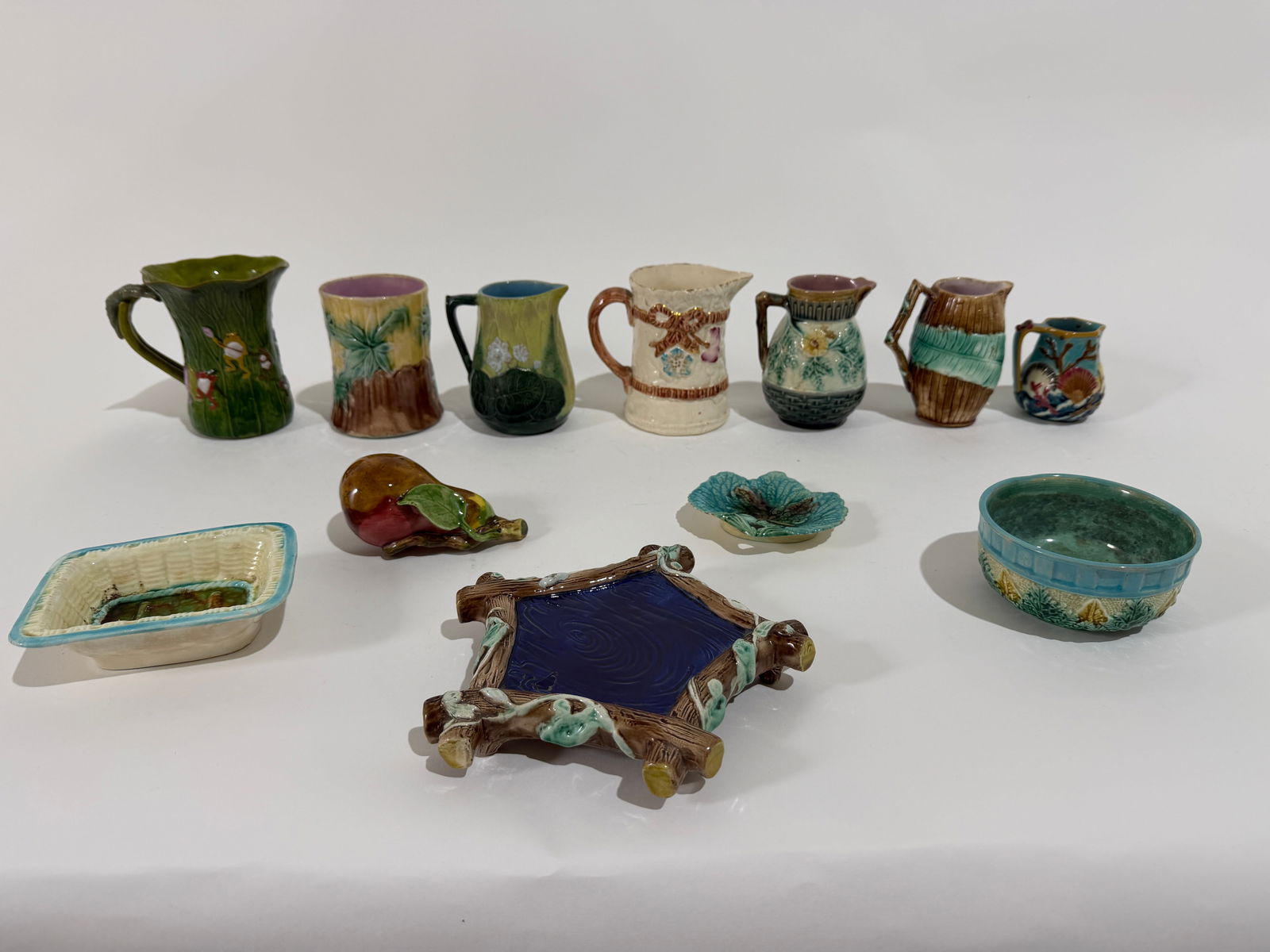 12 Assorted Vintage Majolica Pieces: A group of 12 assorted vintage Majolica pieces