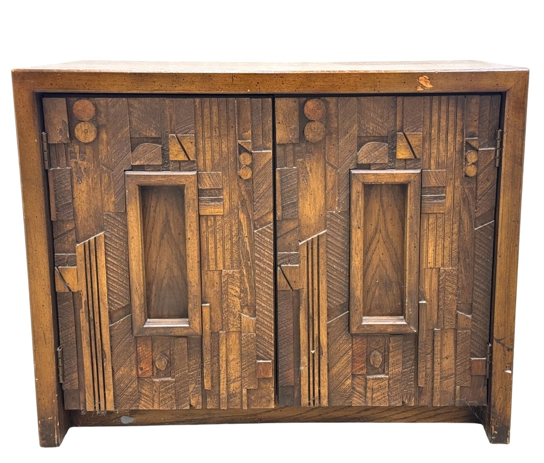 Lane Brutalist Style Night Stand: A Lane Pueblo mid century modern brutalist nightstand. The nightstand features bold chunky sculptural doors. Offers storage with a single shelf behind two doors Dimensions: H:22" W:28" D:16"