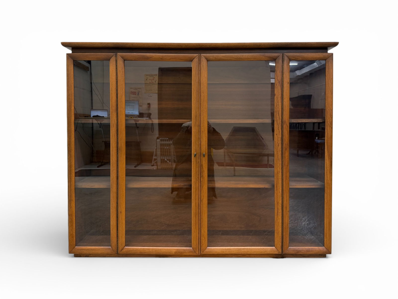 Young Manufacturing Display Cabinet: A Young Manufacturing Display Cabinet with brass interior hinges. Cabinet hutch top is being sold separate from credenza. The final photo shows the cabinet on top of the coordinating credenza. This li