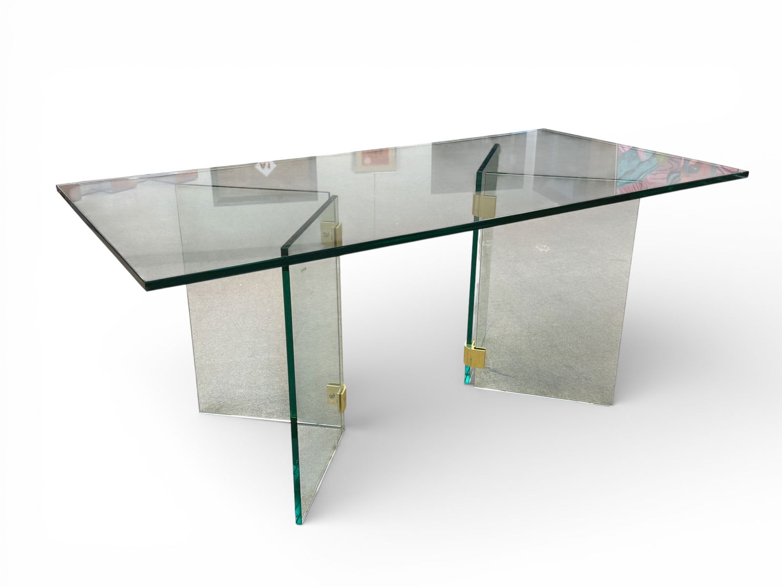 Pace Glass & Brass Coffee Table: A Pace 3-part glass coffee table with brass hinges on the base Dimensions: H:17" W:40" D:20"
