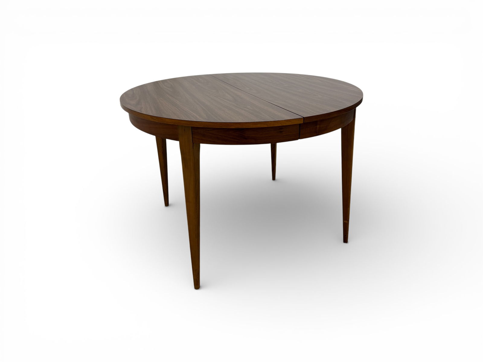 Walnut with Laminate Top Extension Dining Table: Walnut with Laminate Top Extension Dining Table. Includes two leaves. Dimensions: H:29.5" W:44" D:44" Individual Leaf Dimensions:W:17.5" D:44"