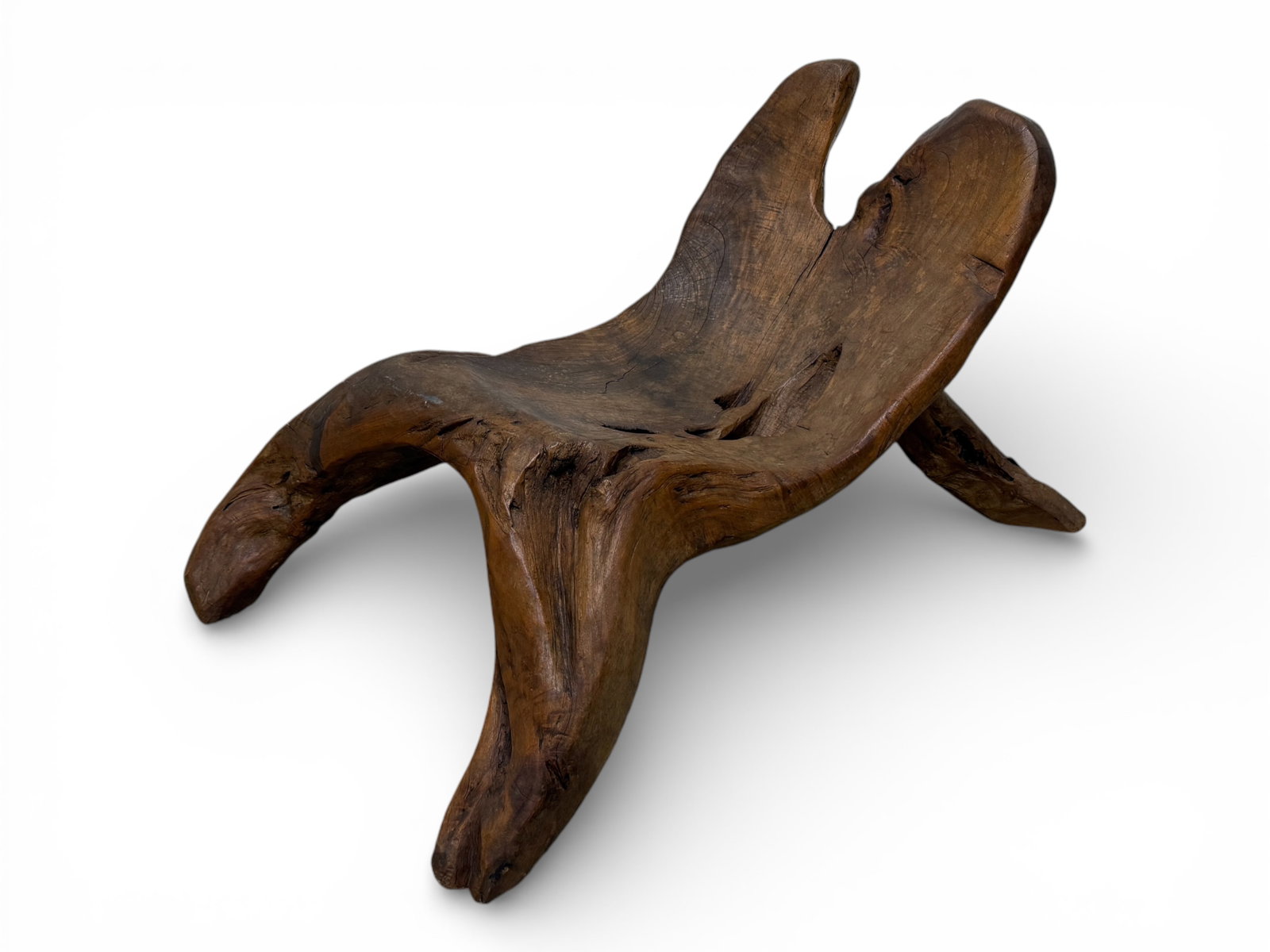 French Hand Sculpted Chestnut Lounge Chair: French hand sculpted chestnut lounge chair. European studio craft movement, c. 1960s. Hand carved chestnut, and functional as both a chair and art object. Dimensions: H:22.4" W:17.9" D:40.4" Seat Heig