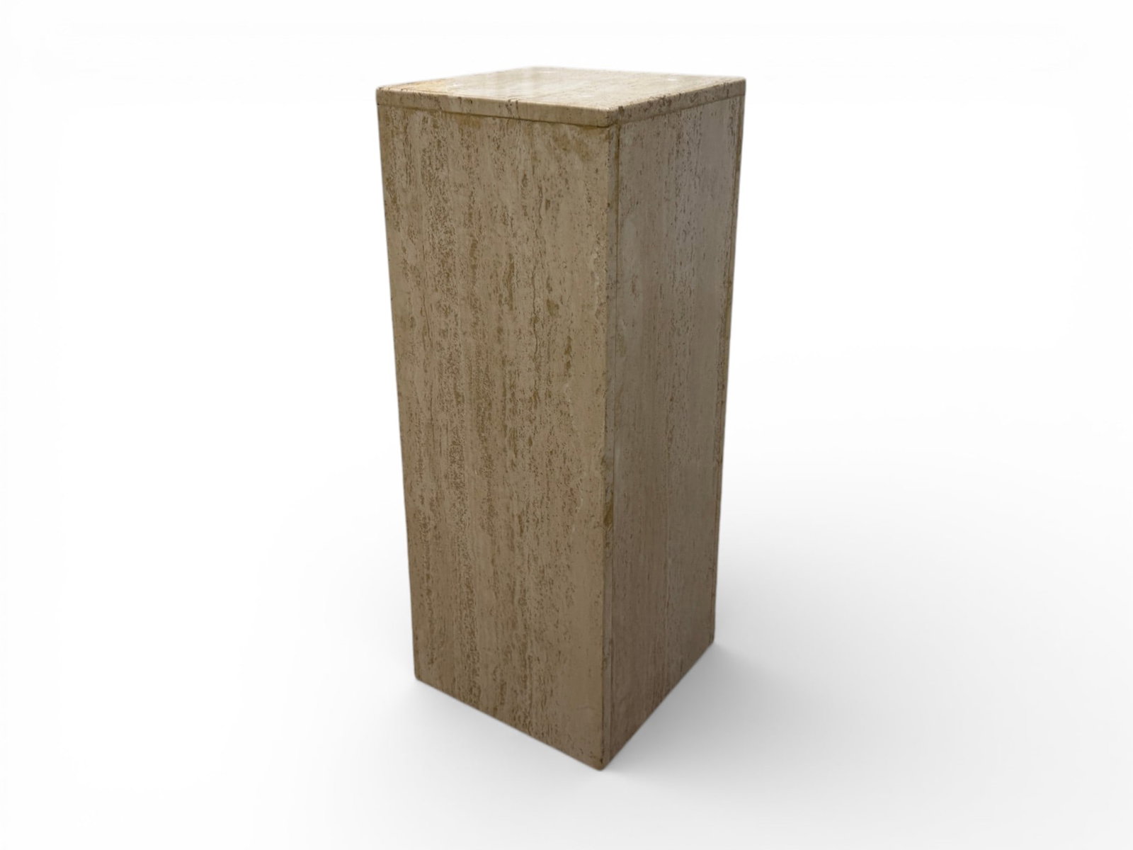 Tall Square Italian Travertine Plinth / Pedestal: A tall square Italian Travertine Pedestal / Plinth crafted of a mixture of honed and polished travertine. Circa the 1960s. The frame is hollow and crafted with individual pieces. Natural variations in
