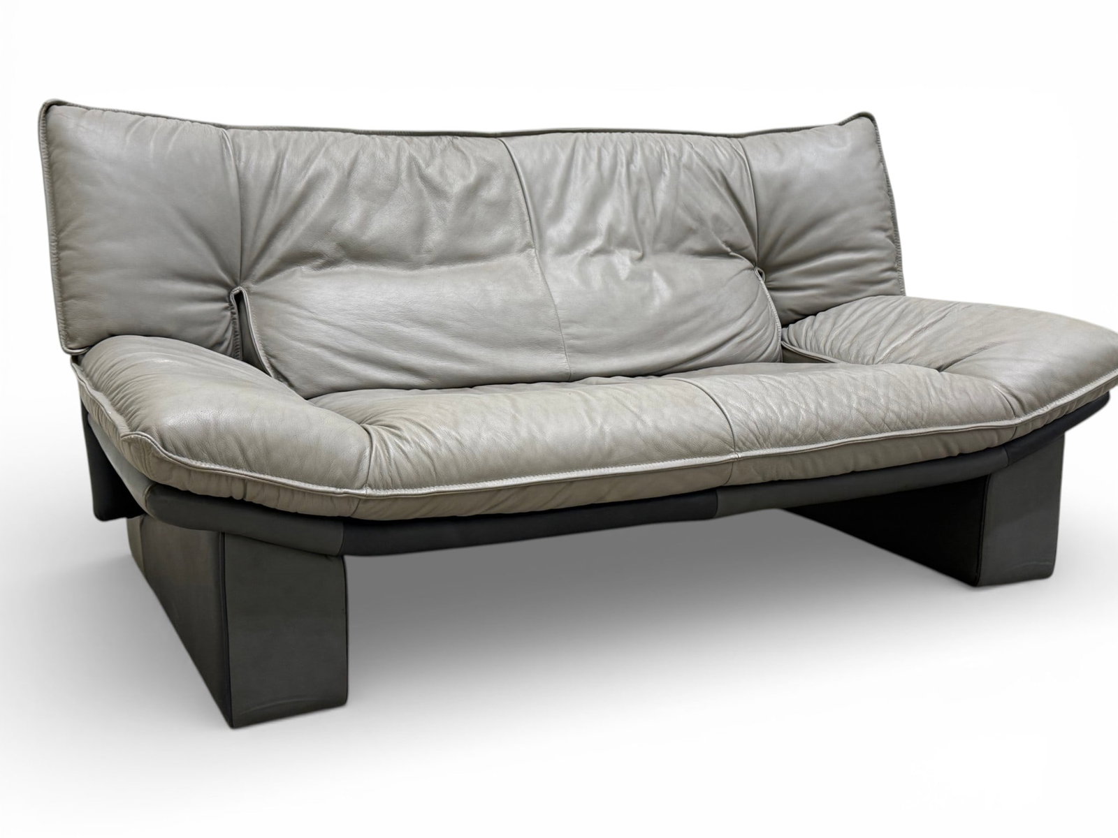 Nicoletti Leather Lounge Chair: A Nicoletti Italian leather lounge chair Dimensions: H:32" W:64" D:38" Seat Height:16"