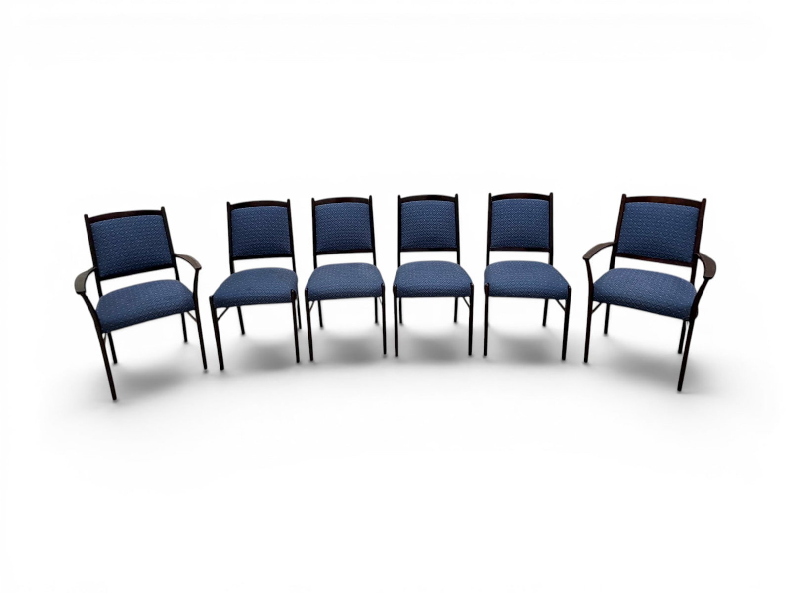 6 Dining Chairs Attributed to Dyrlund: Set of 6 rosewood dining chairs attributed to Dyrlund. 4 side chairs and 2 armchairs. Rosewood, with geometric upholstery. Unsigned. Side chair dimensions: H: 37" W: 19" D: 20.25", seat height 19.5" A