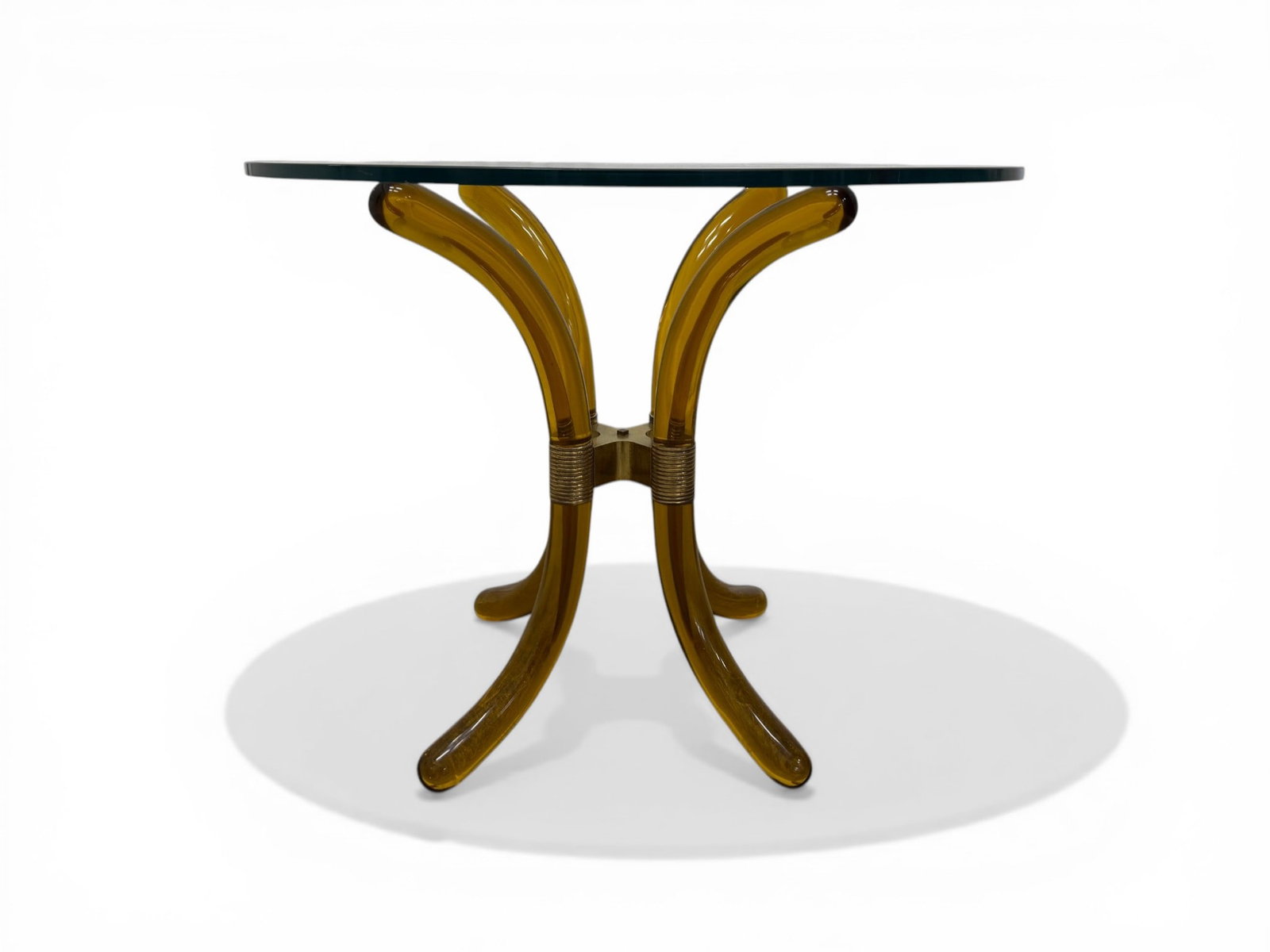 Lucite, Brass, & Glass Side Table: A mid-century modern amber colored Lucite, Brass, & Glass Side Table. Dimensions: H:25.5" W:30" D:30"