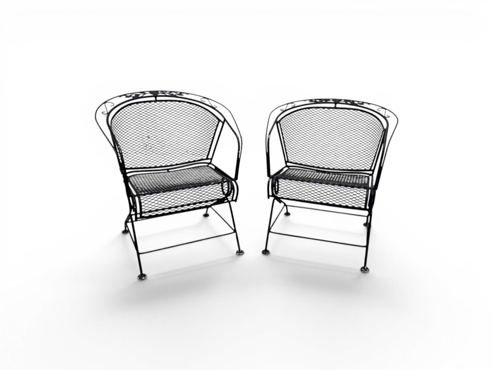 Pair Salterini Iron Spring Chairs: Salterini wrought iron spring chairs. Dimensions: H: 32" W: 25.25" D: 26.25", seat height 16"