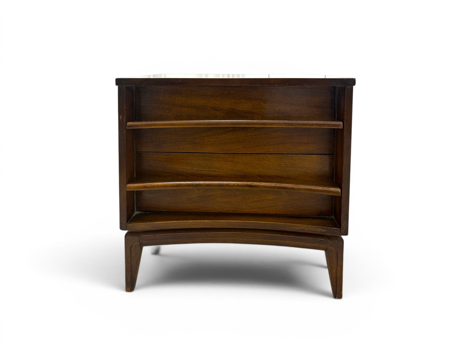 Concave Walnut Nightstand: Mid-century concave curved front nightstand. Walnut, 2 drawers. Marked illegibly inside top drawer. Dimensions: H: 24.5" W: 24" D: 17.75"