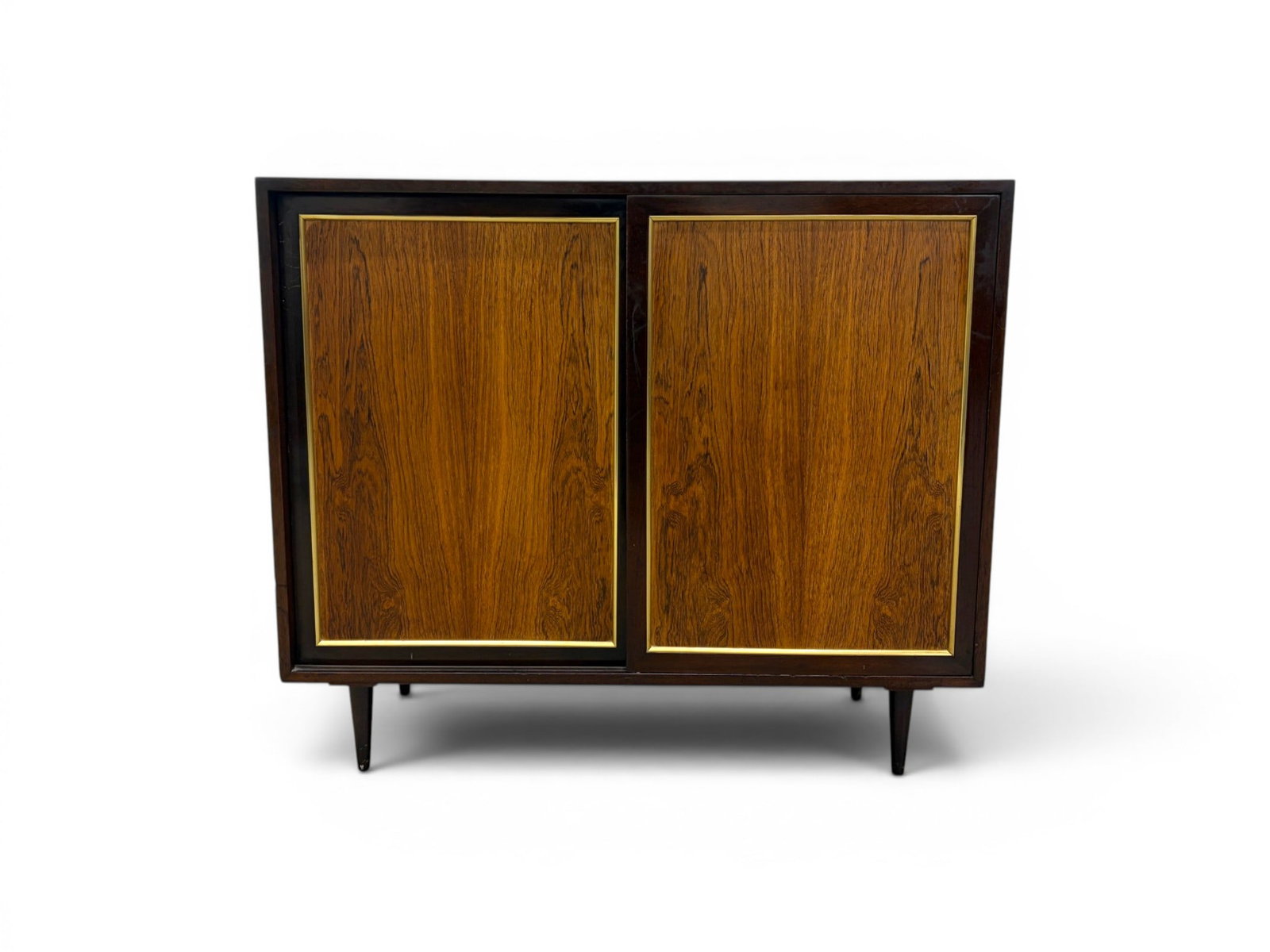 Harvey Probber Sliding Door Cabinet / Chest: Harvey Probber sliding door cabinet or chest. 2 sliding doors, interior with 4 drawers on one side and 1 drawer and shelves on the other. Harvey Probber label to the interior of one drawer. Dimensions