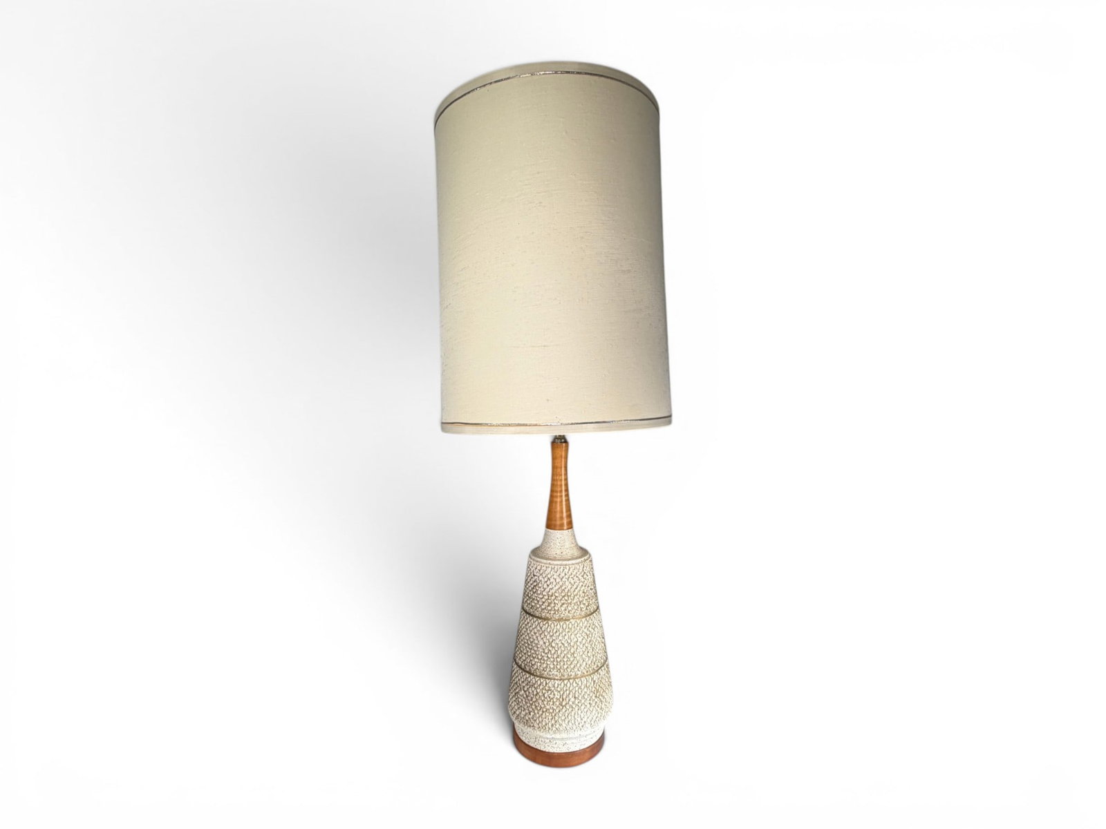 FAIP Mid-Century Modern Chalkware & Teak Lamp: F.A.I.P. mid-century modern teak and chalkware table lamp. Signed on the base of the lamp. Dimensions without shade to top of finial: H: 30" W: 6" D: 6"