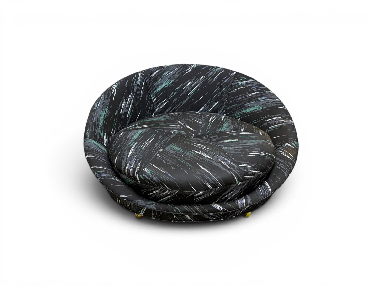 Milo Baughman Satellite Lounge Chair: Milo Baughman satellite lounge chair with abstract pattern upholstery, on casters. Unmarked. C. 1960s. Dimensions: H: 30" W: 56.5" D: 56"