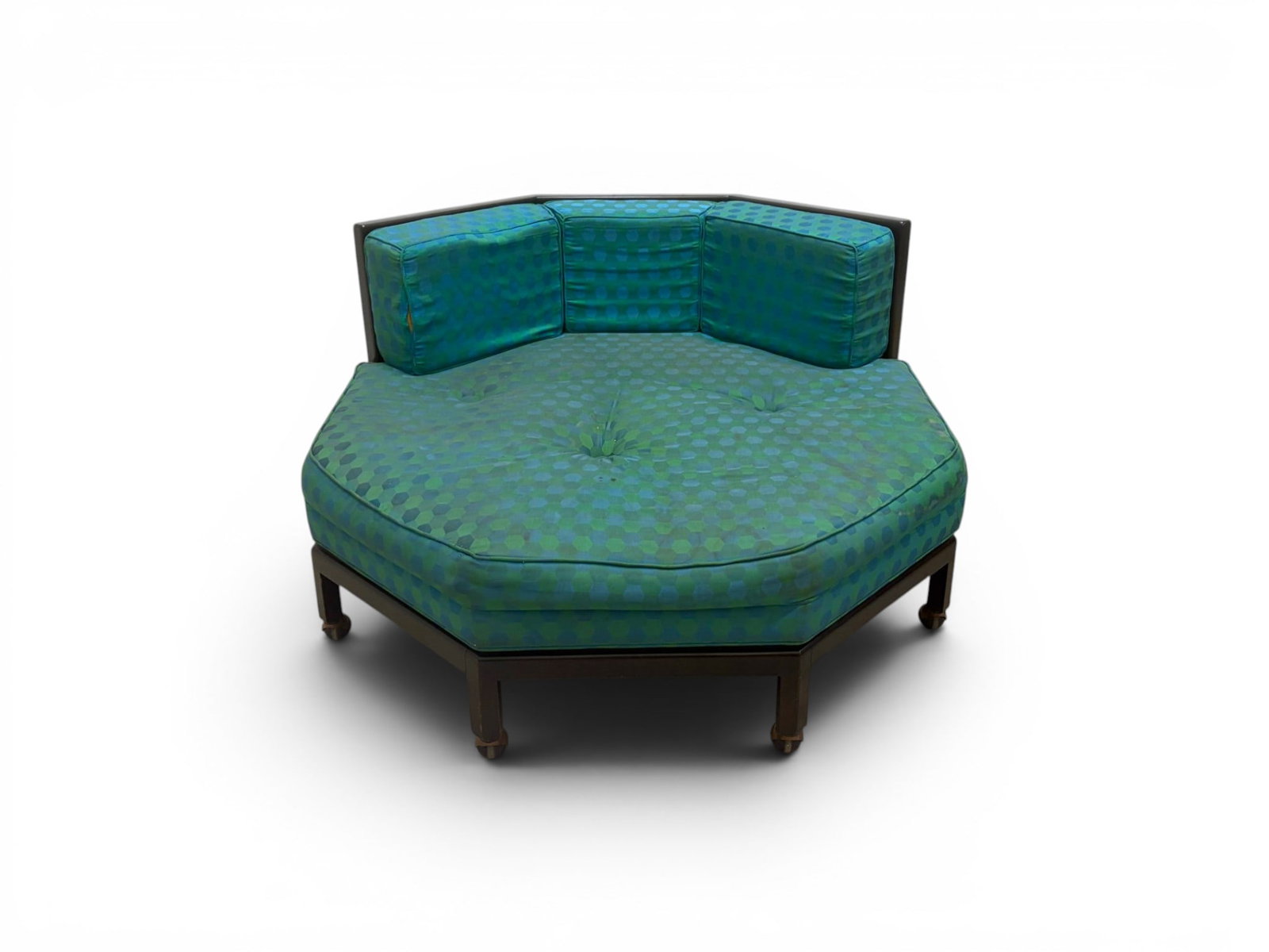 Widdicomb Octagonal Lounge Chair: Widdicomb octagonal lounge chair on casters. With geometric upholstery. Widdicomb label to the underside. Dimensions: H: 28.5" W: 47" D: 49.5"
