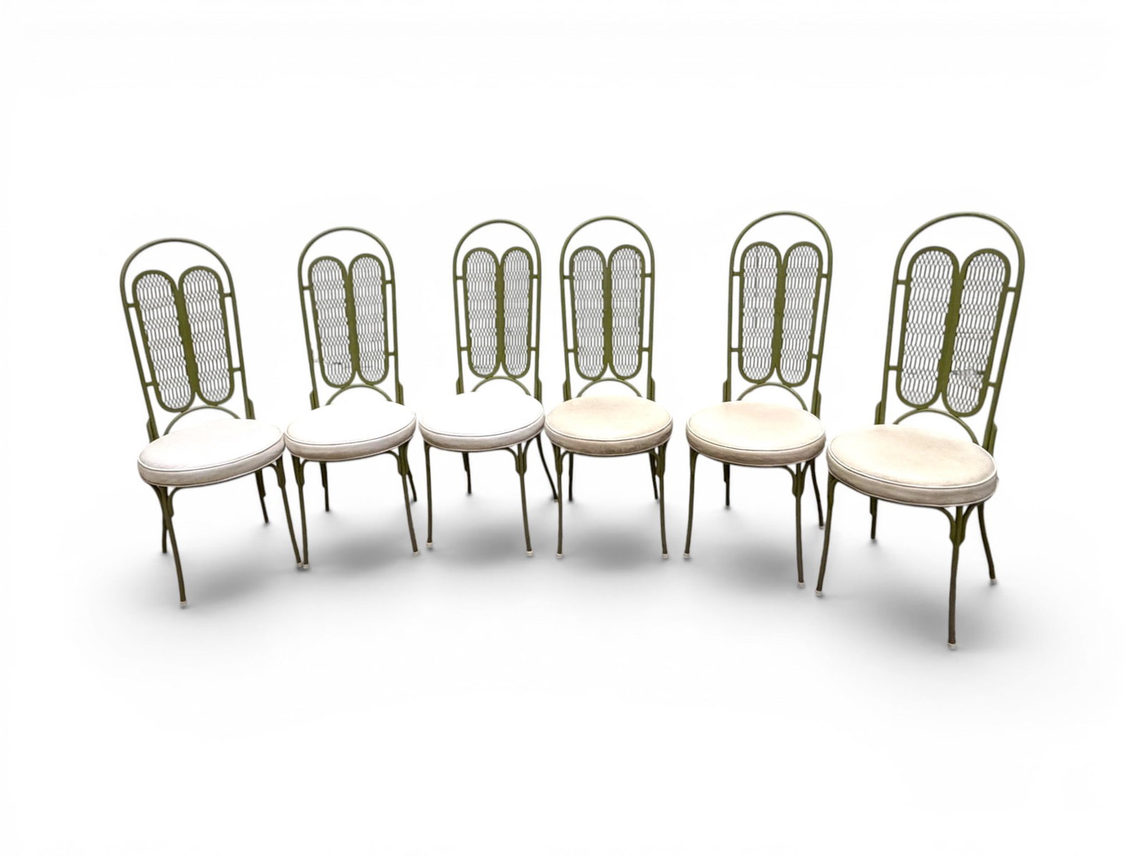 6 Wrought Iron Dining Chairs: Set of 6 wrought iron dining chairs. Green painted iron frames, white vinyl seats. Dimensions: H: 41.75" W: 16" D: 20", seat height 18.5"