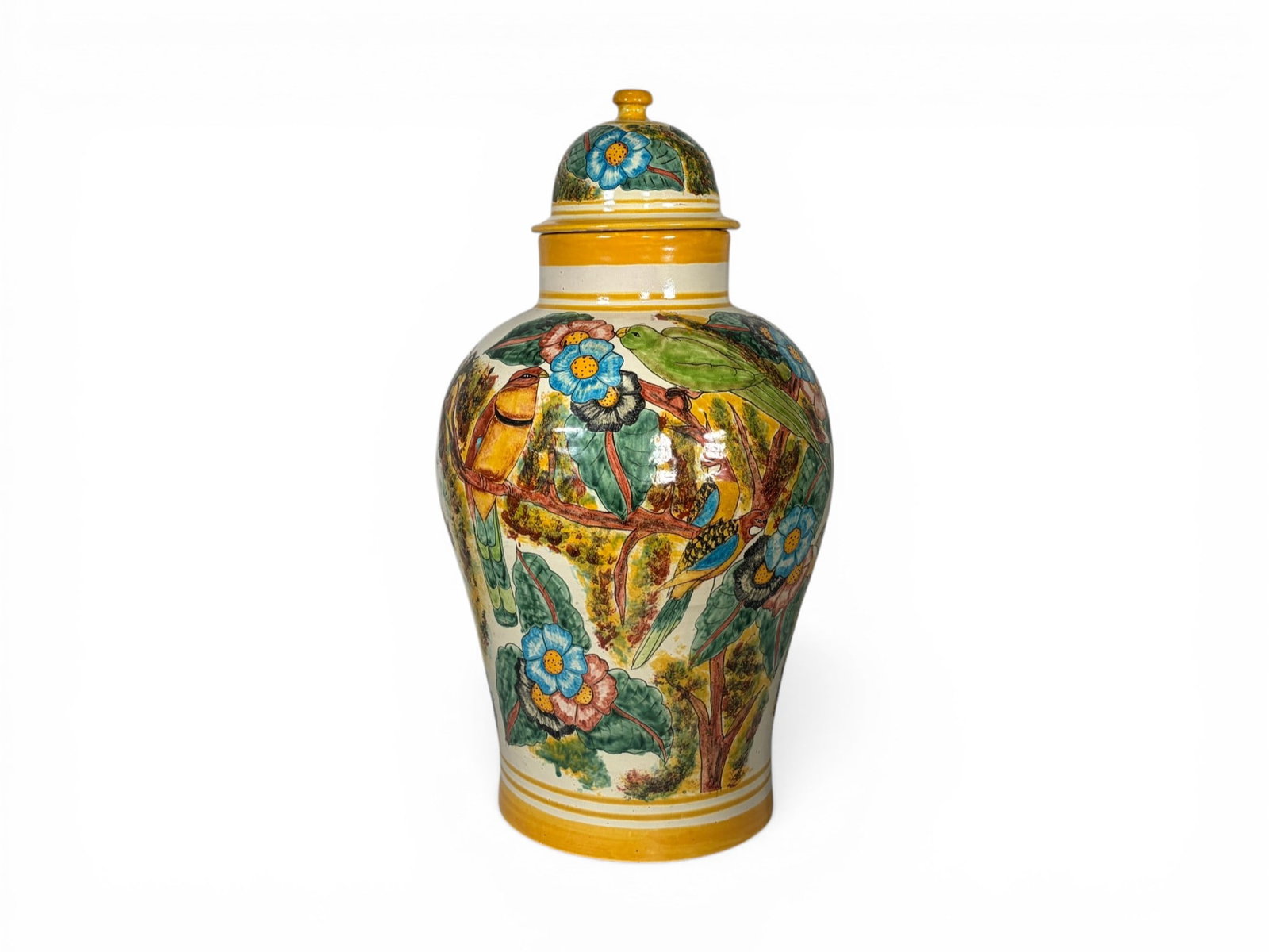 Talavera Style Mexican Pottery Jar: Talavera style Mexican pottery lidded jar or urn. Marked H. Mex on the underside. Polychrome decoration of birds and flowers. Dimensions: H: 24" W: 13" D: 13"