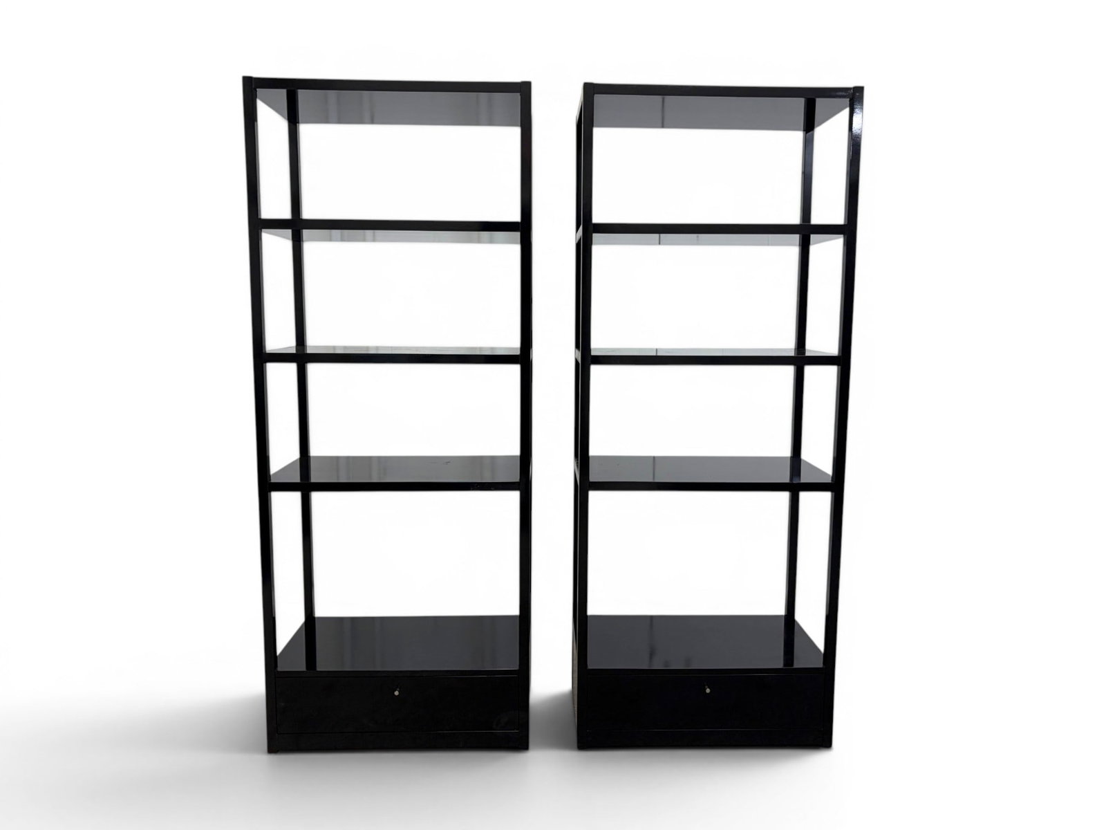 Pair of Councill Black Lacquer Etageres: Pair of Councill Furniture black lacquer etageres. Bases with 1 drawer, marked Councill on drawer interiors. Dimensions: H: 79.625" W: 32" D: 18"
