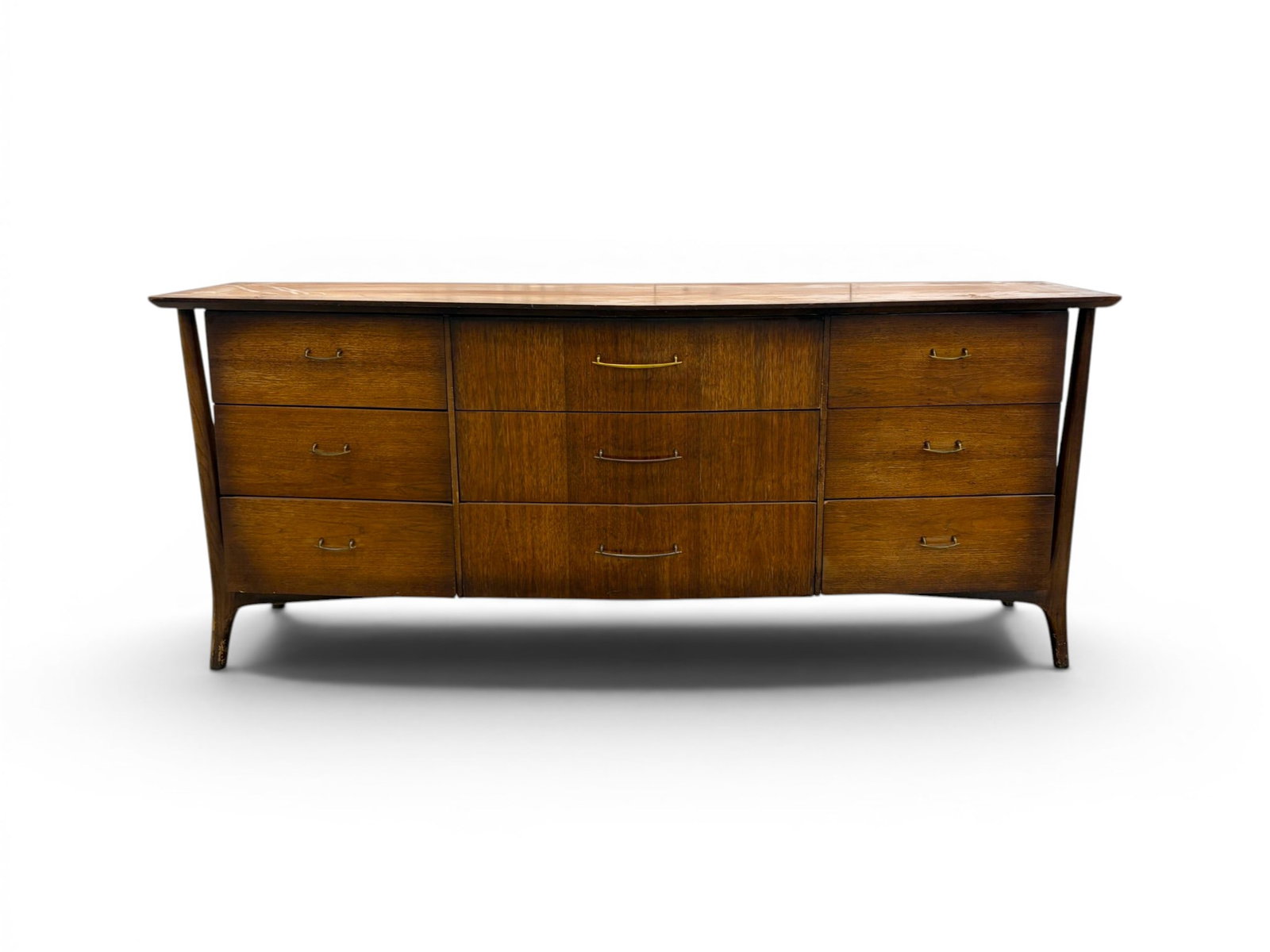 Unaugusta Triple Dresser in the Style of Piet Hein: Unaugusta modern walnut 9 drawer triple dresser, in the style of Piet Hein. Dimensions: H: 32" W: 76" D: 21"