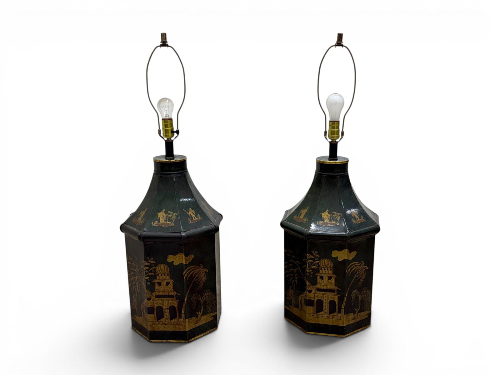 Pair Chinoiserie Tole Tea Canister Lamps: Pair of tole tea canister lamps with Chinoiserie decoration. Dimensions without shades to top of finials: H: 14.5" W: 8" D: 7"