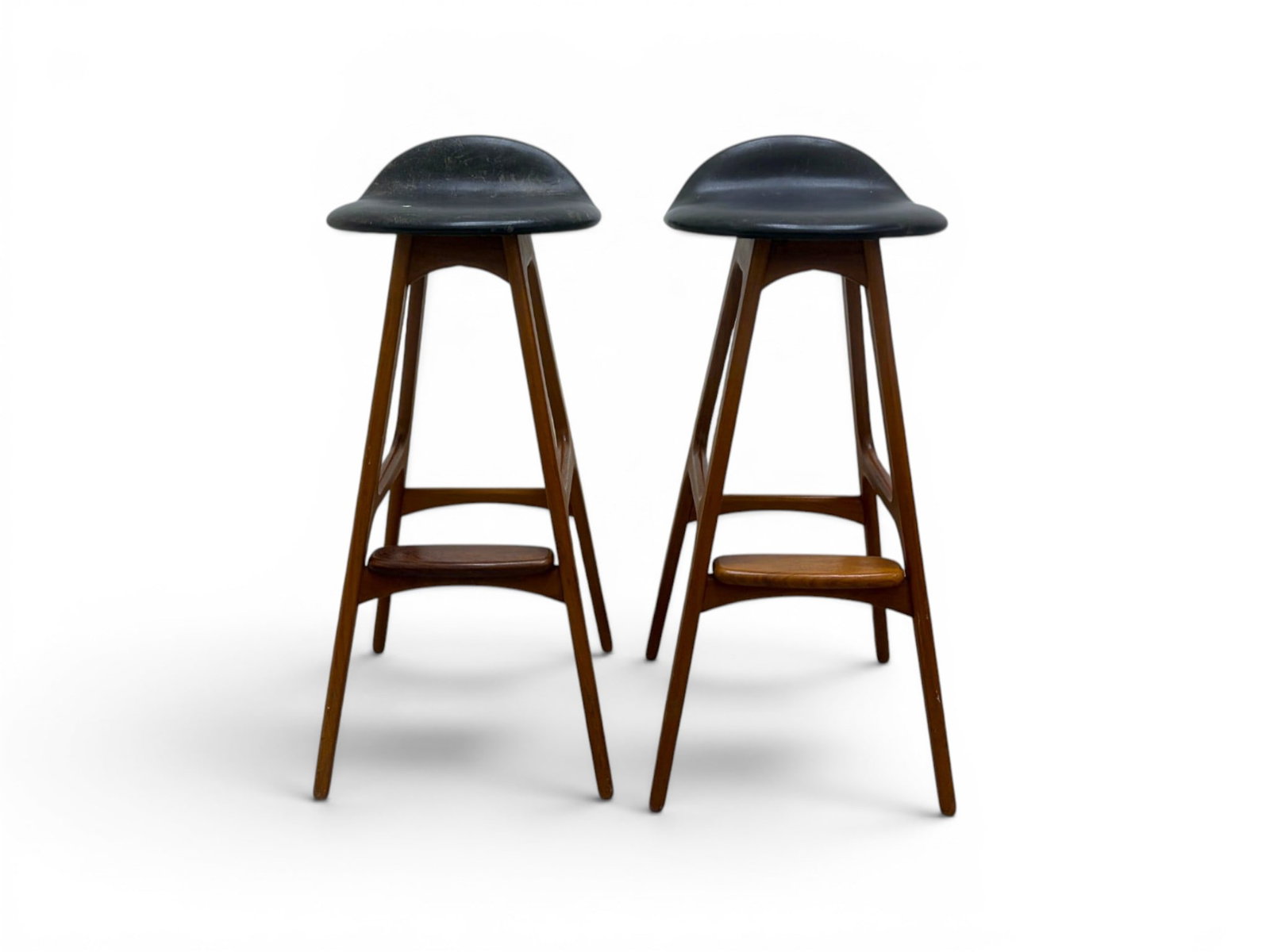 Pair Erik Buck for Oddense Maskinsnedkeri Stools: Erik Buch (Buck) for Oddense Maskinsnedkeri, pair of Danish modern stools. With Oddense Made in Denmark labels with Danish control marks on the undersides. Dimensions: H: 33" W: 14" D: 13.5", seat
