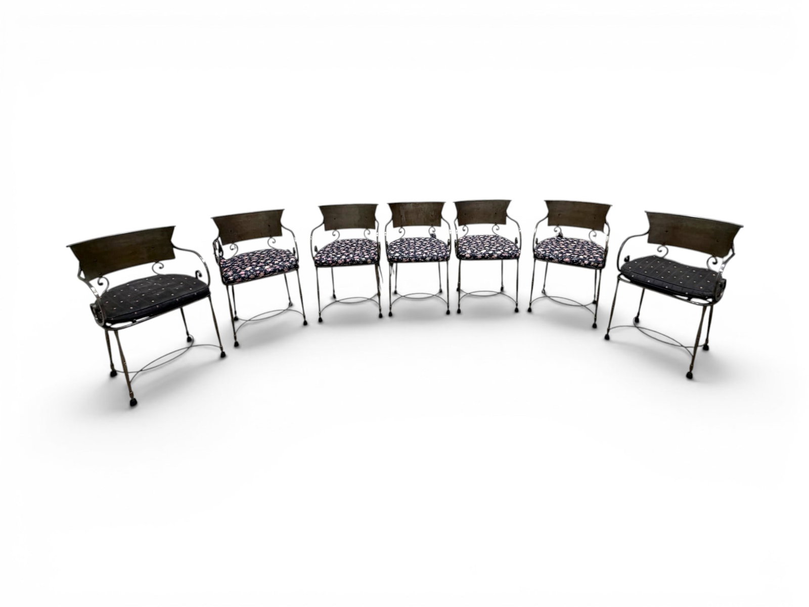 7 Italian Polished Steel Dining Chairs: Set of 7 polished steel Italian armchairs. Unmarked. Dimensions: H: 32" W: 19" D: 19", seat height 17.5"
