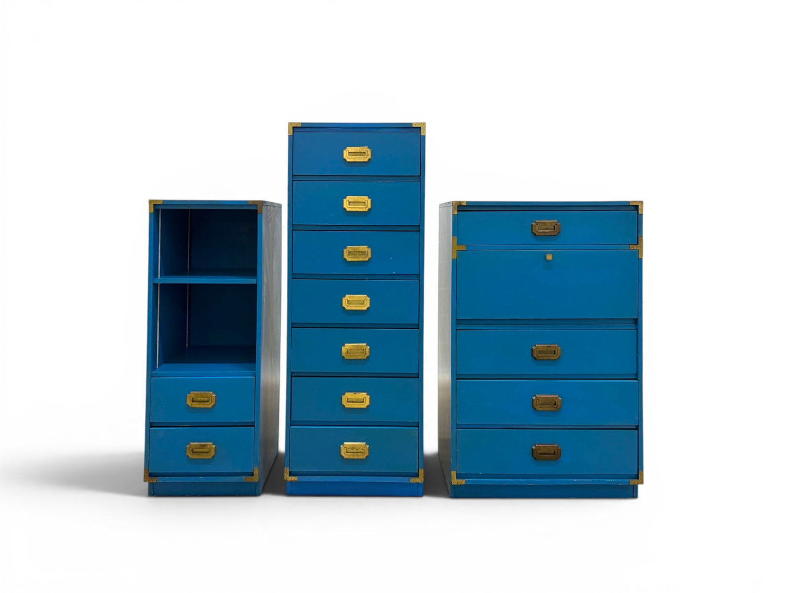 3 Piece Campaign Style Bedroom Set: 3 piece campaign style bedroom set. Blue veneer brass hardware. Tall chest, shelf with 2 drawers, drop cabinet bar with 4 drawers. Tall chest dimensions: H: 60.75" W: 22.125" D: 16" Shelf dimensions: