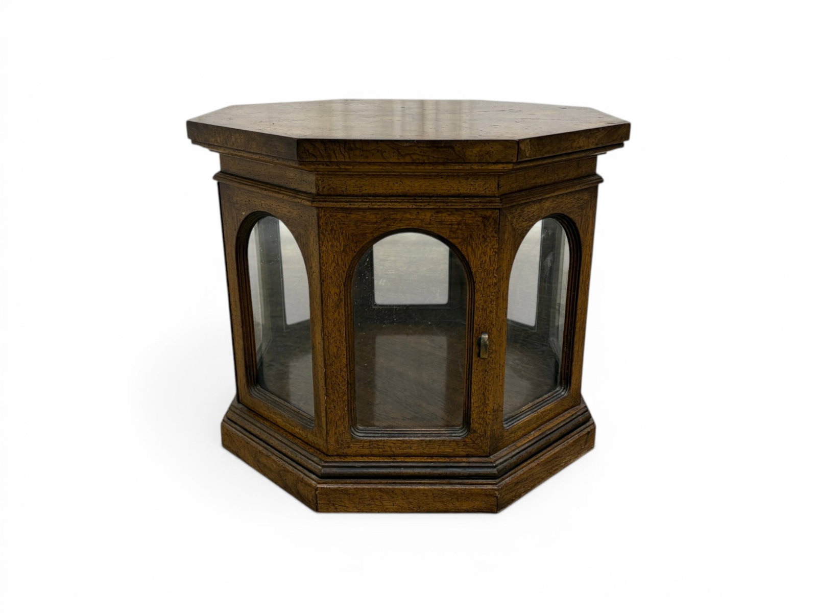 Octagonal Wood & Glass Display Table: An Octagonal form display table / vitrine, with a burled veneer top, and glass panels around the base. Stamped Gordon's Inc. on the underside. Dimensions: H:21" W:25" D:25"