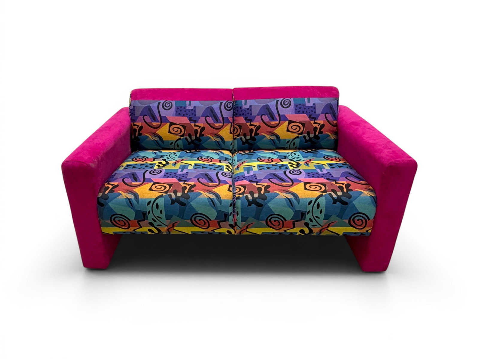 Loveseat With Abstract Upholstery: Loveseat with pink and abstract 80s style upholstery. Dimensions: H: 29.5" W: 58" D: 32", seat height 17"