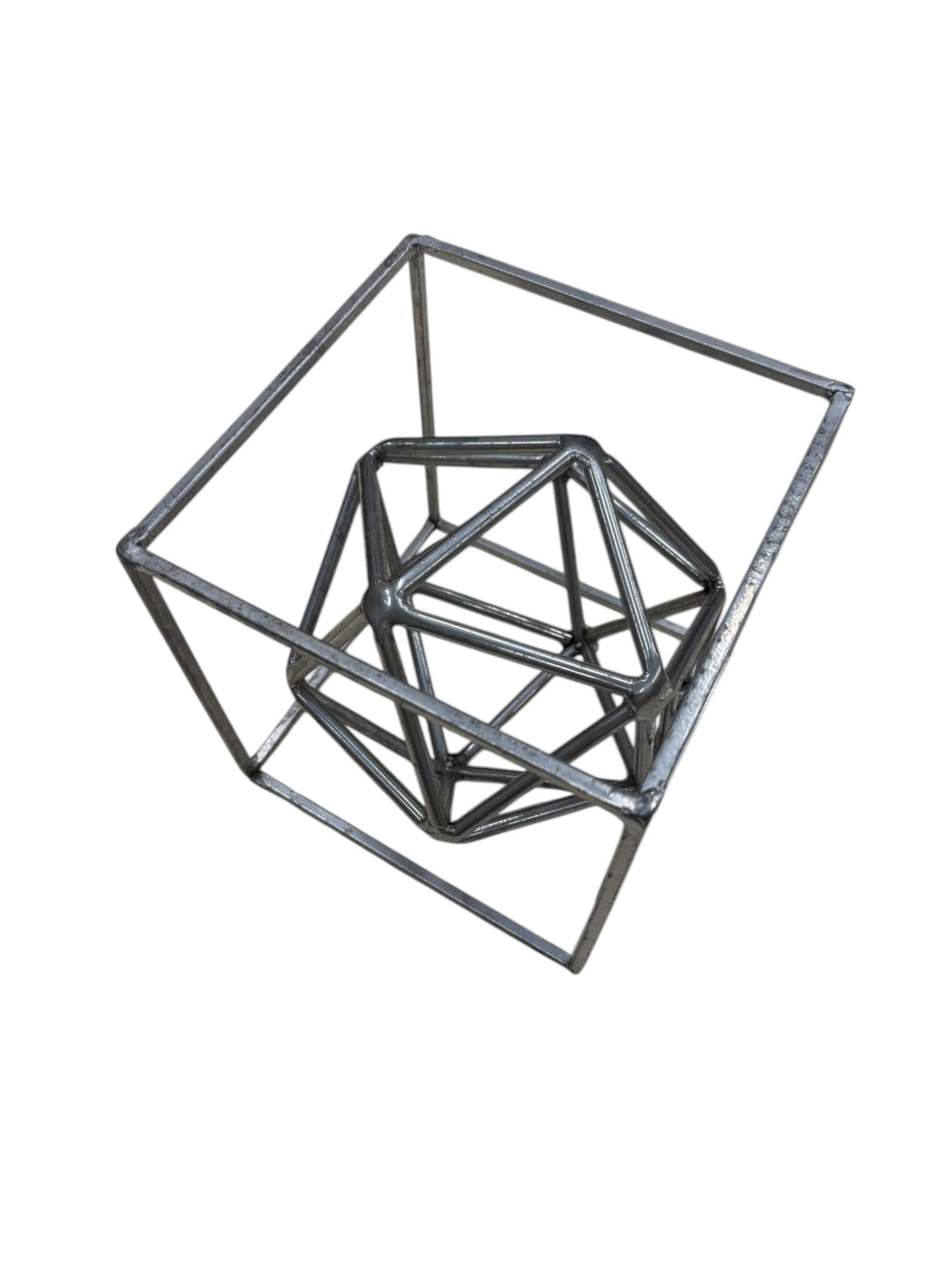 Geometric Metal Sculpture: A geometric metal wire frame hypercube Dimensions: H:7.25 W:7.25" D:7.25"
