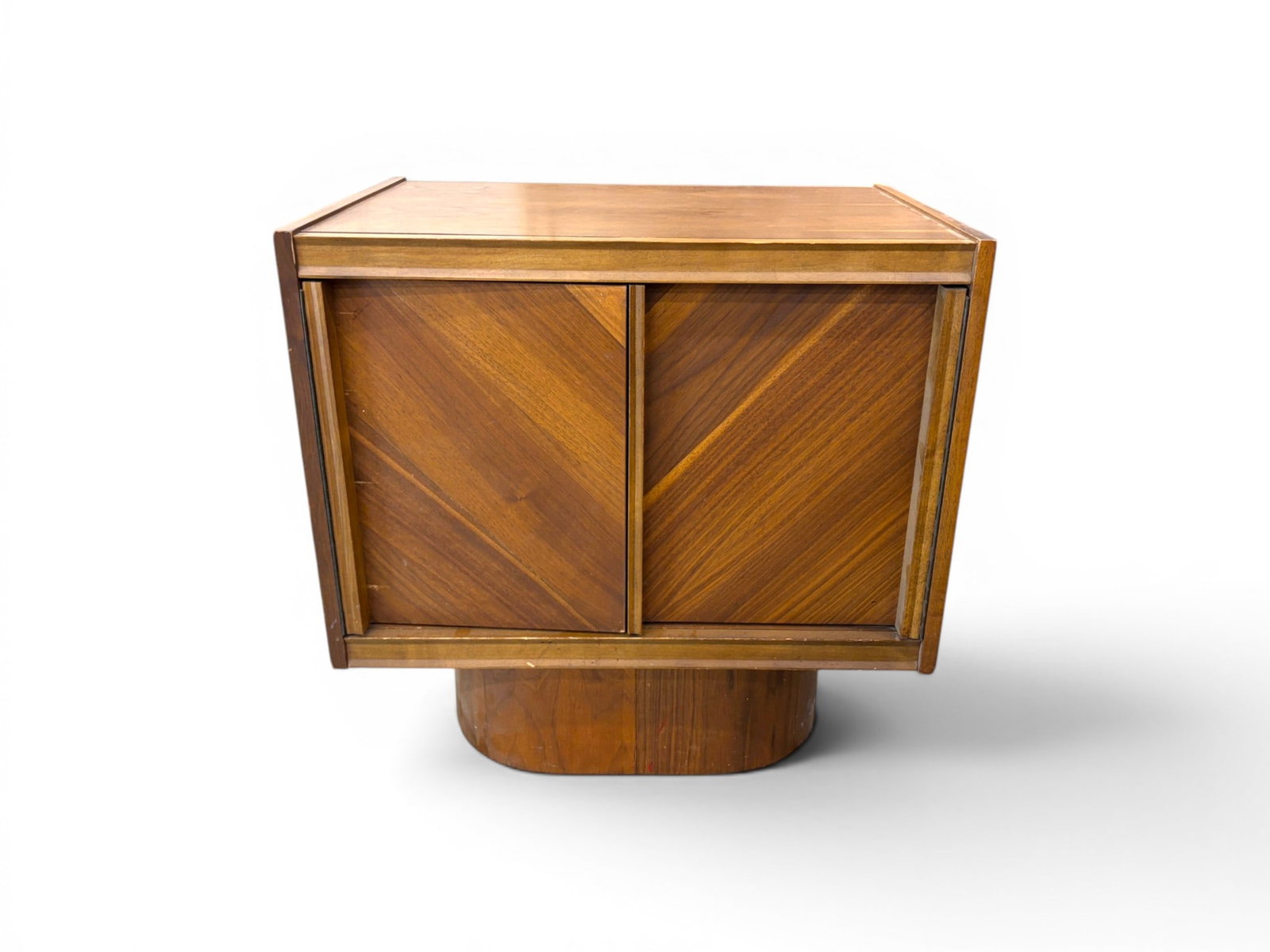 Tobago Brutalist Style Nightstand: Tobago brutalist style nightstand with rounded bottom. Dimensions: H: 24.625" W: 24.875" D: 17"