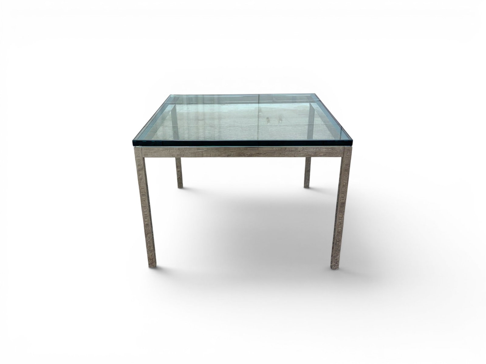Chrome & Glass Side Table: Chrome and glass side table. Unmarked. Dimensions: H: 17" W: 24" D: 24", glass .75" thick