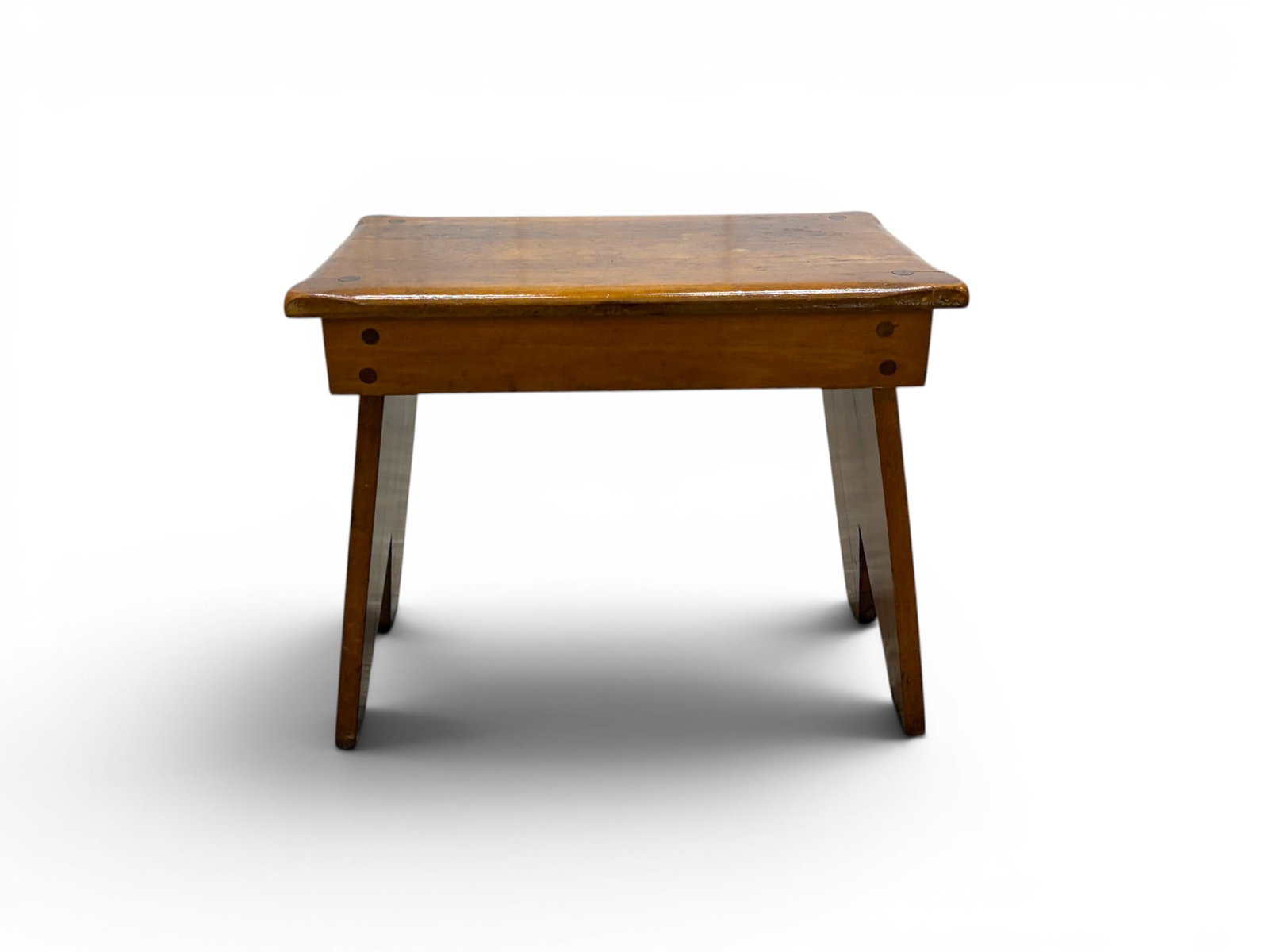 JB Van Sciver Primitive Style Stool: J.B. Van Sciver primitive style stool. Label on the underside. Dimensions: H: 17" W: 21.25" D: 12"