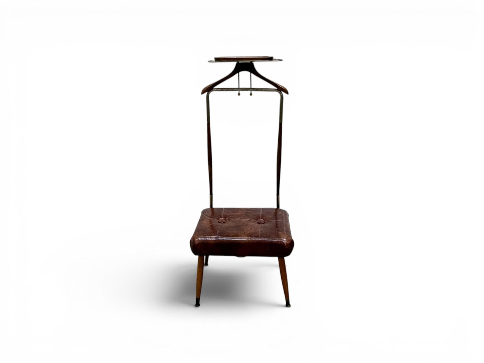 Pearl-Wick Val-O-Seat Butler's Chair / Valet: Pearl-Wick "Val-O-Seat" butler's chair valet. Teak and brass, with vinyl seat. Pearl-Wick label on the underside. Dimensions: H: 47" W: 19.5" D: 18.5"