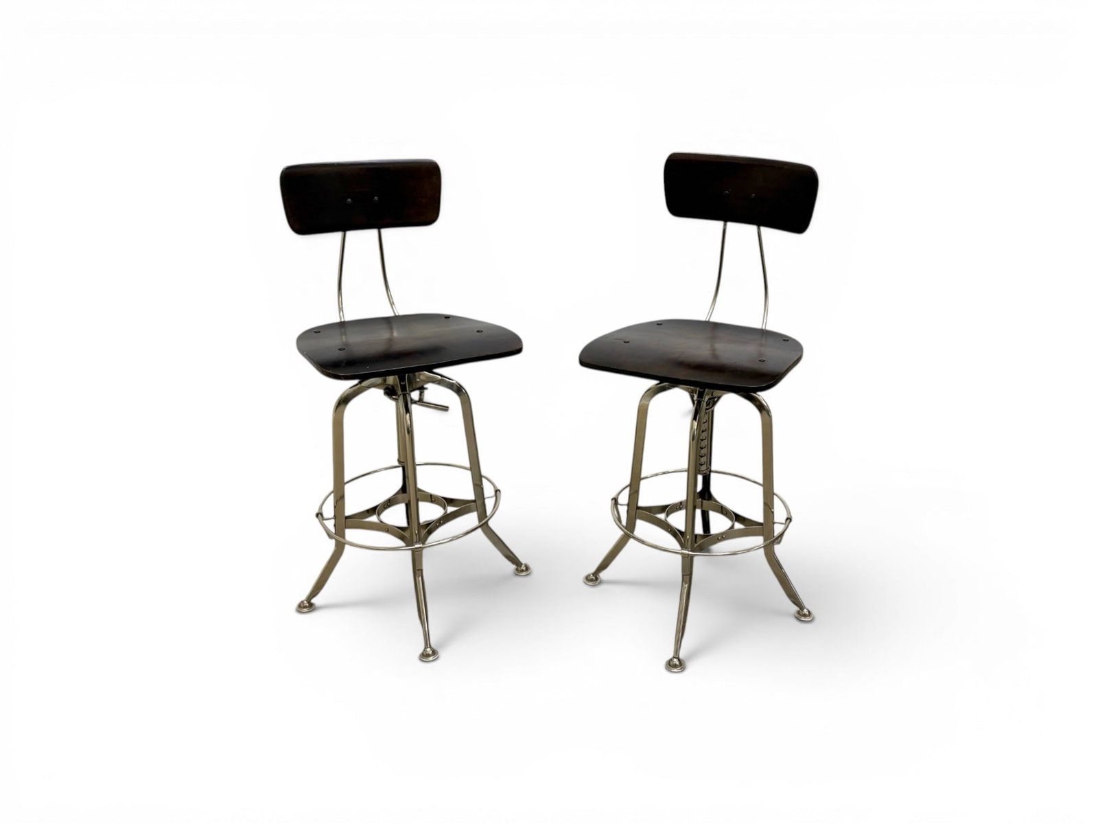 Pair of Restoration Hardware Toledo Stools: Pair of Restoration Hardware "Toledo" draftsman's style adjustable chairs / stools. Dimensions at lowest height (as photographed): H: 37.75" W: 16.25" D: 19", seat height 25.25", tallest height