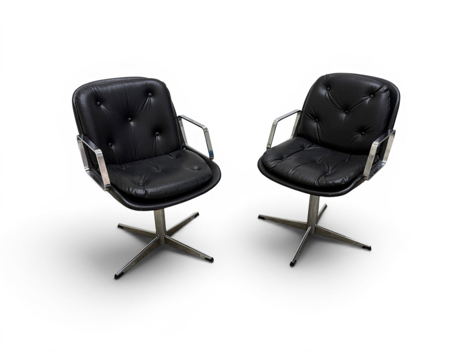 Pair Doerner Faultess Baughman Style Armchairs: Pair of Doerner Faultess Milo Baughman style swivel armchairs. Chrome and tufted black leather. Dimensions: H: 34" W: 22.75" D: 25.5", seat height 19.25"