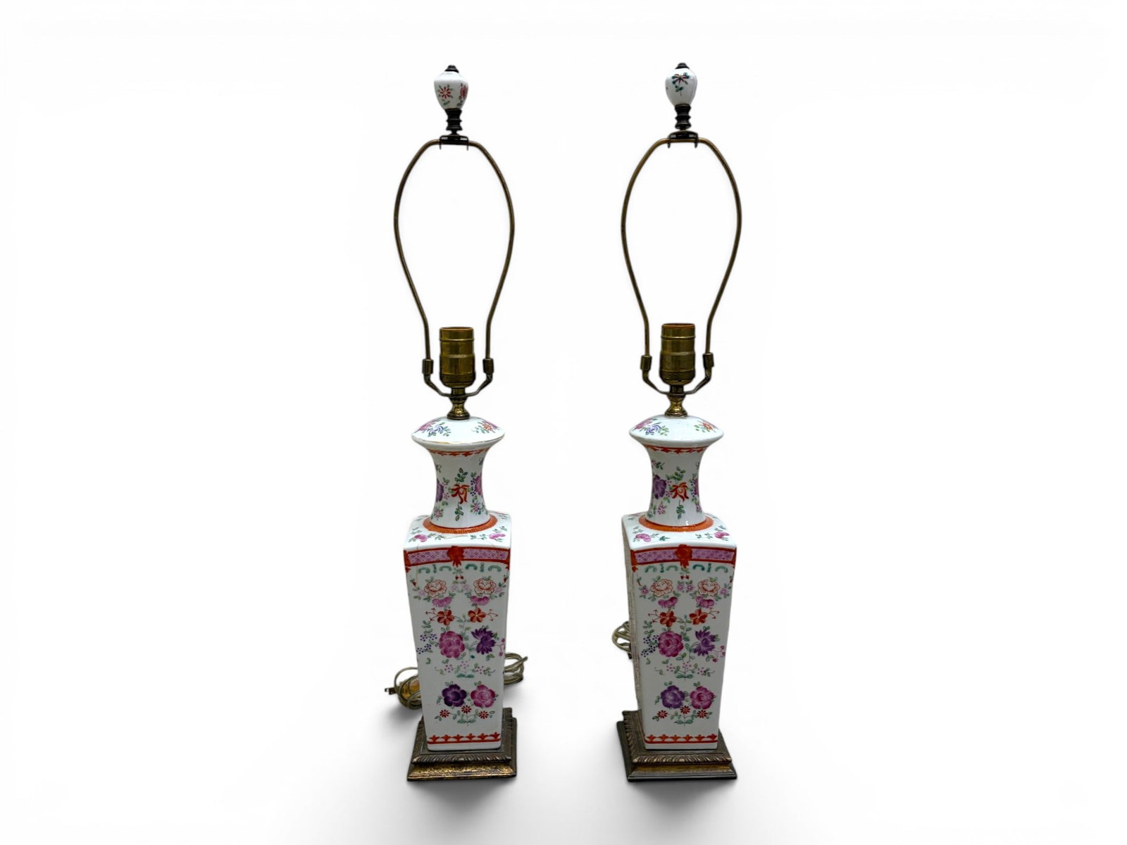 Pair of Chinese Porcelain Famille Rose Lamps: Pair of Chinese famille rose porcelain lamps. Dimensions including harps and finials: H: 25.75" W: 4.25" D: 4.25"