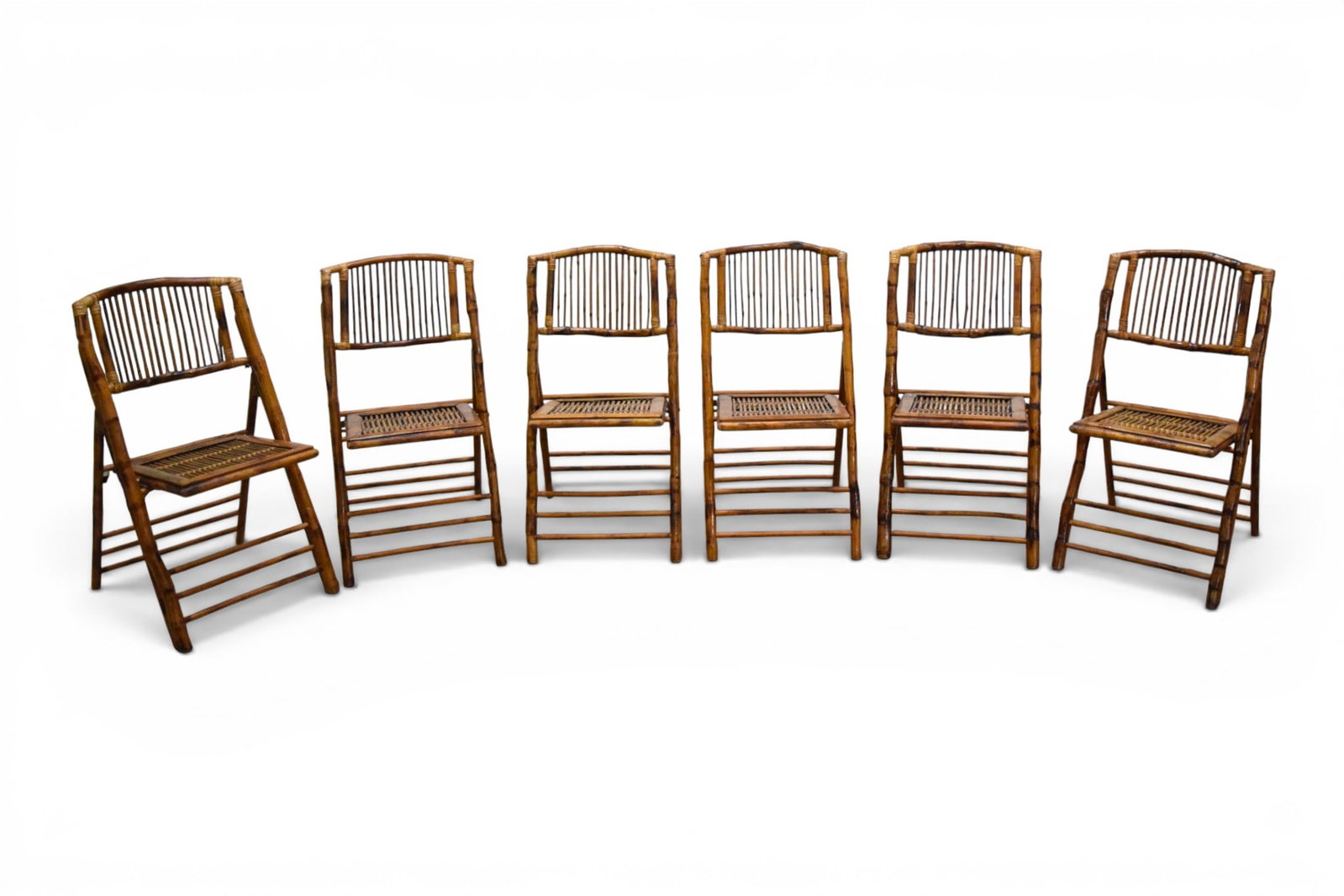 6 Bamboo Folding Chairs: Set of 6 bamboo folding chairs. Dimensions: H: 35" W: 18.25" D: 24", seat height 18"