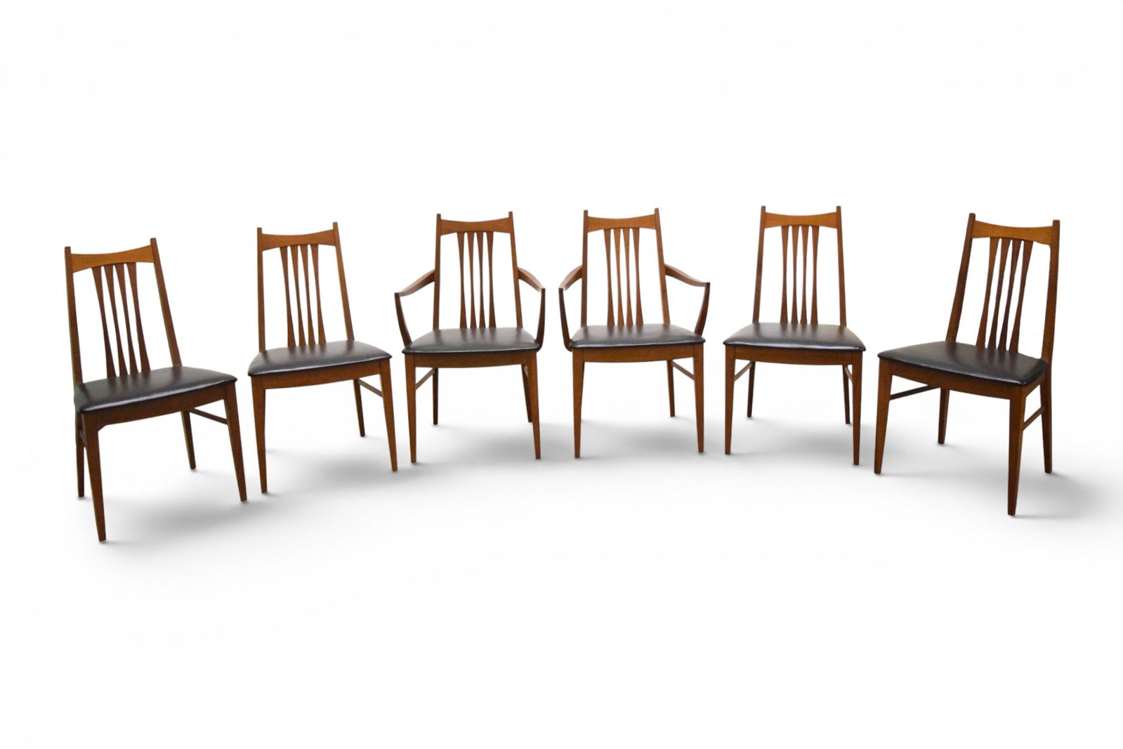 6 West Michigan Furniture Co. Dining Chairs: West Michigan Furniture Co., set of 6 mid-century modern dining chairs. 2 armchairs and 4 side chairs. All with labels on the undersides. Side chair dimensions: H: 36.5" W: 23" D: 20.25", seat height 