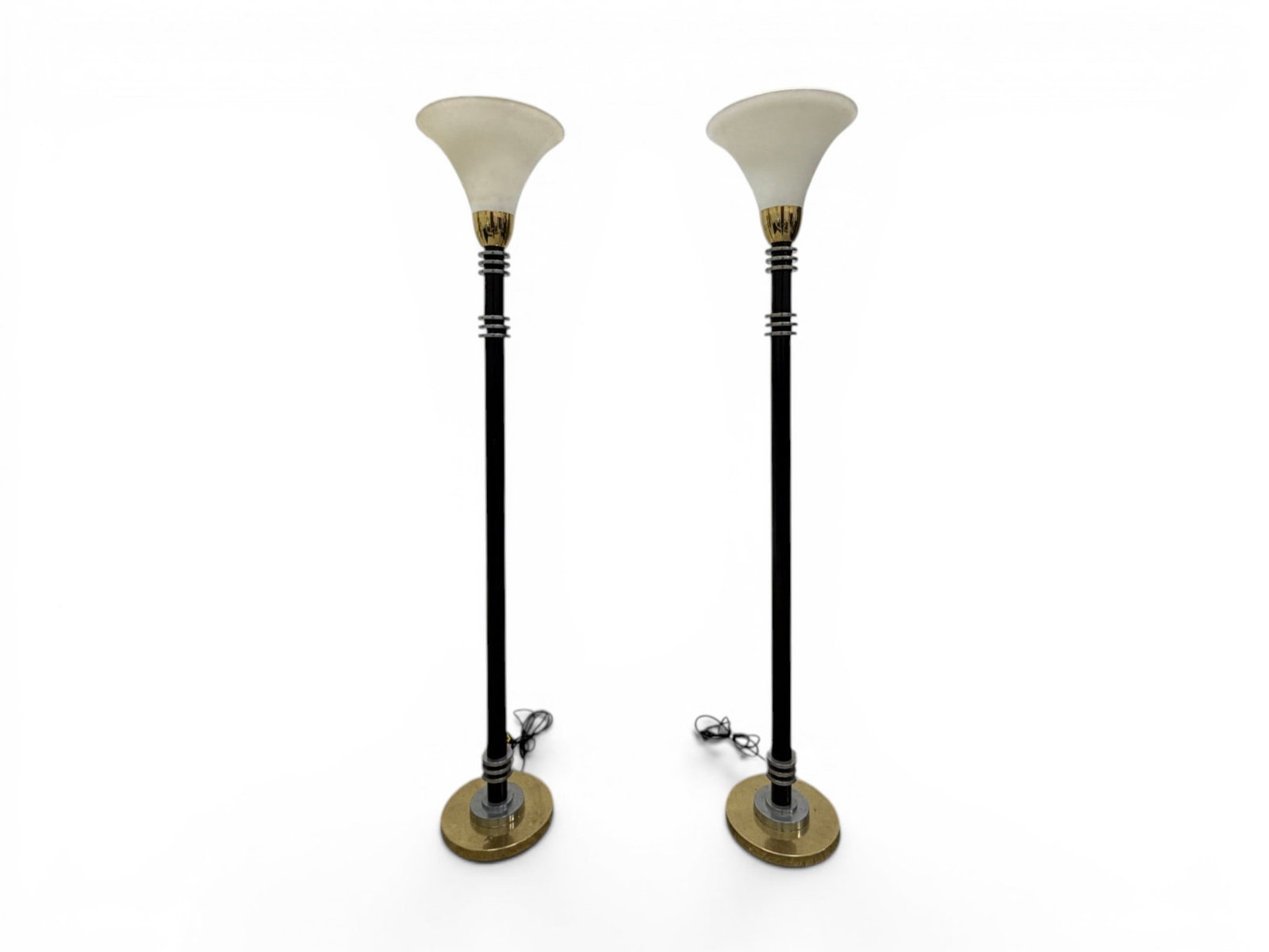 Pair of Art Deco Style Torchiere Floor Lamps: Pair of art deco style torchieres. Brass, chrome and black metal with frosted glass shades. Dimensions with shades: H: 68.5" W: 11.5" D: 11.5"