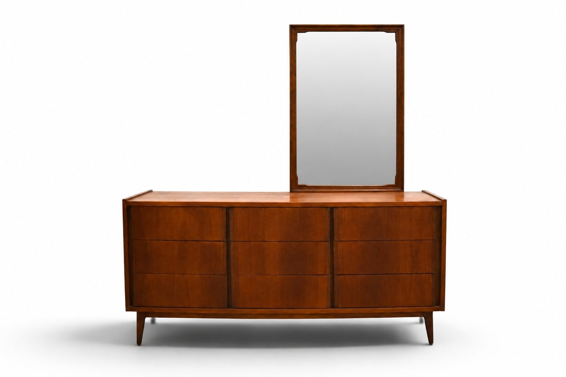 Bassett Furniture Dresser & Mirror: Bassett Furniture 9 drawer walnut dresser with mirror. Bassett mark to interior of top drawer. Dresser dimensions: H: 30.5" W: 63" D: 19" Mirror dimensions not including supports: H: 42" W: 26.25" D: