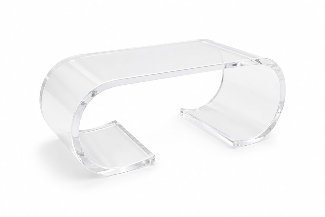 Karl Springer Style Lucite Scroll Coffee Table: Lucite waterfall coffee table with scroll base, in the style of Karl Springer or Paul M. Jones. Unsigned. Dimensions: H: 16" W: 36" D: 16", lucite 1" thick.