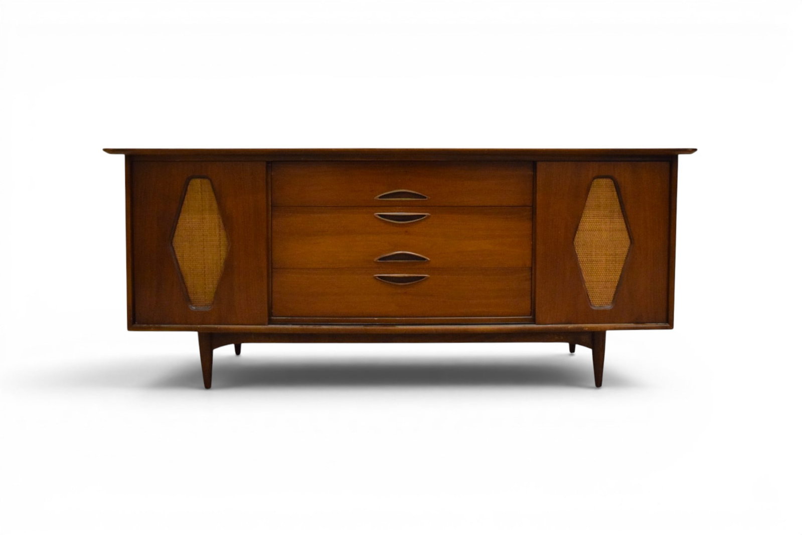 Kent Coffey The Greenbrier Dresser: Kent Coffey, The Greenbrier dresser. 9 drawers, with 2 sliding doors. Door panels reversible, with cane fronts on one side. Marked inside top drawer.The top of the dresser has been professionally