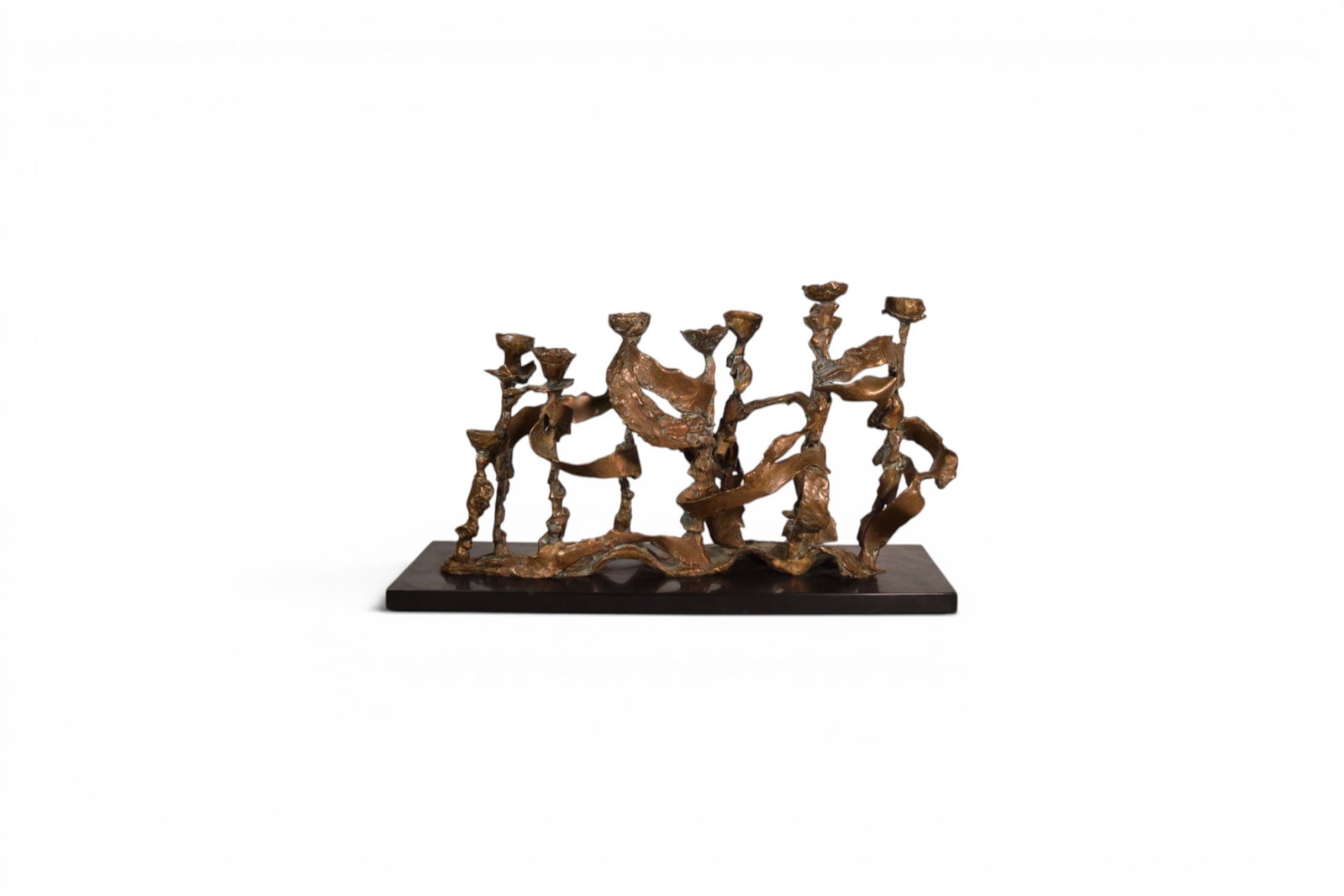 Hana Gerber Bronze Brutalist Style Menorah: Hana Gerber (American / Israeli, 1910-1990). Bronze brutalist style menorah. Signed in English and Hebrew. Dimensions: H: 12" W: 21" D: 7"
